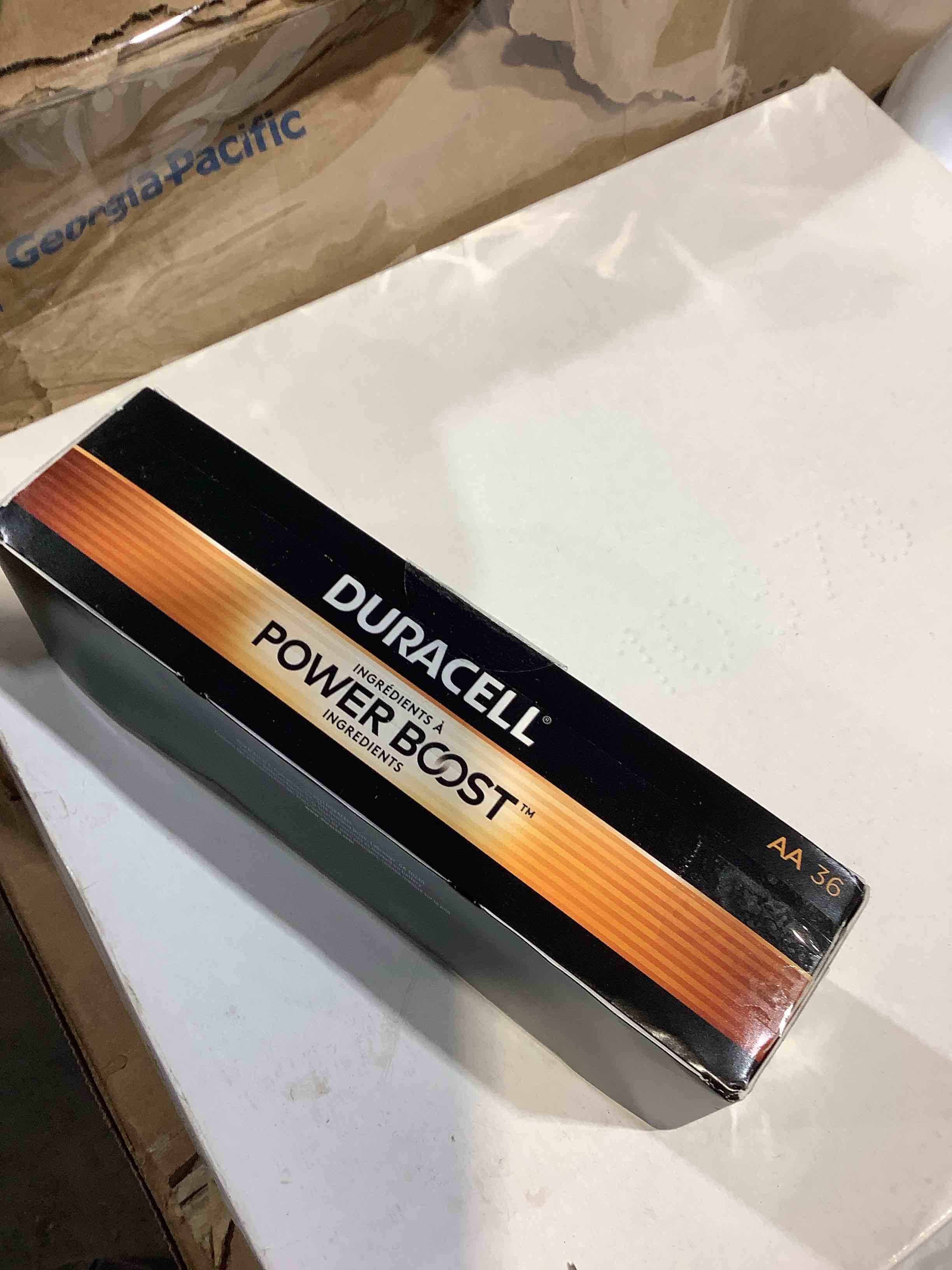 Condition photo showing New/Like New for coppertop alkaline aa batteries 36/pack, in office