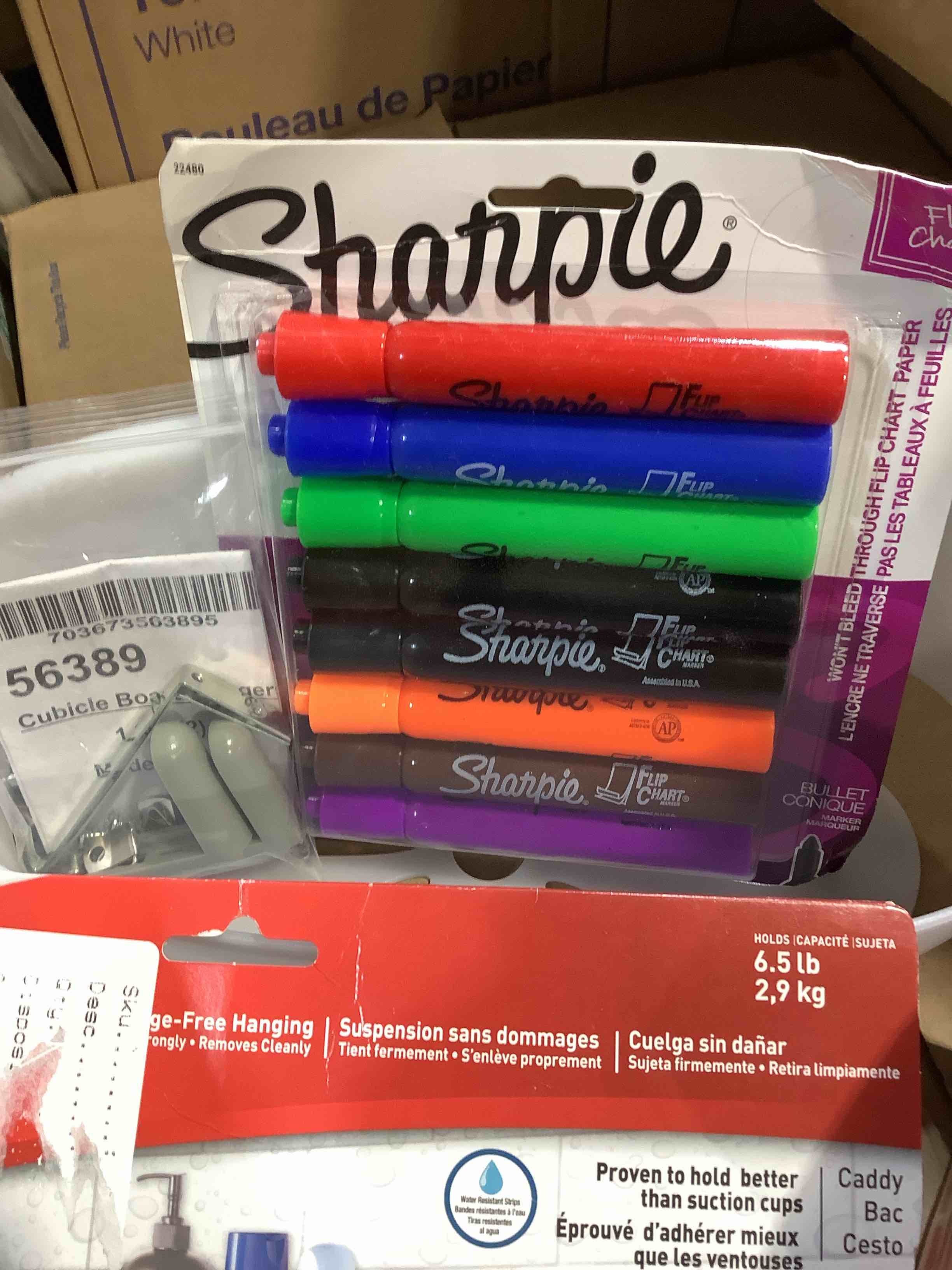 Condition photo showing Good Condition for assortment of office and household supplies: sharpie permanent, swingline stapler, 3m bathroom hanging, paper clips, and more,