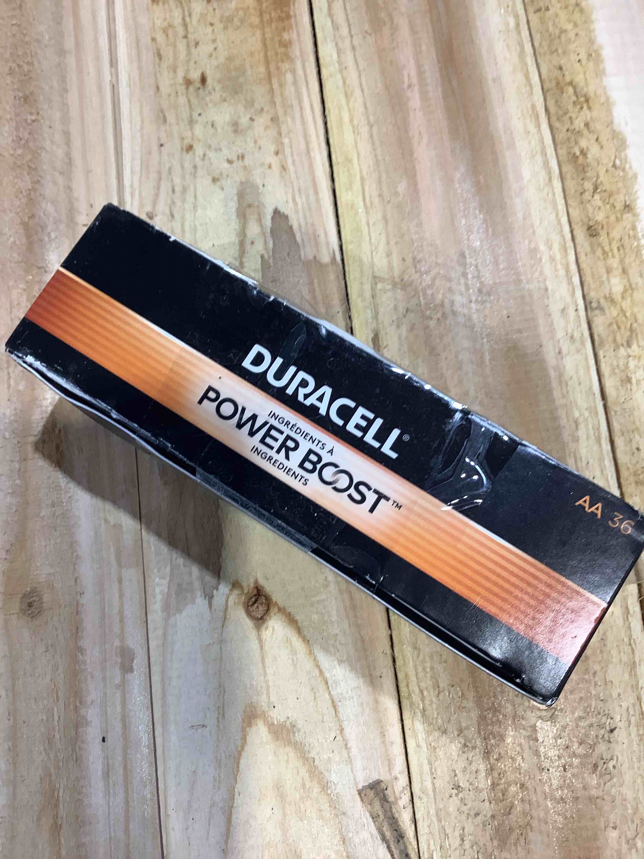 Condition photo showing New/Like New for coppertop alkaline aa batteries 36/pack, in office