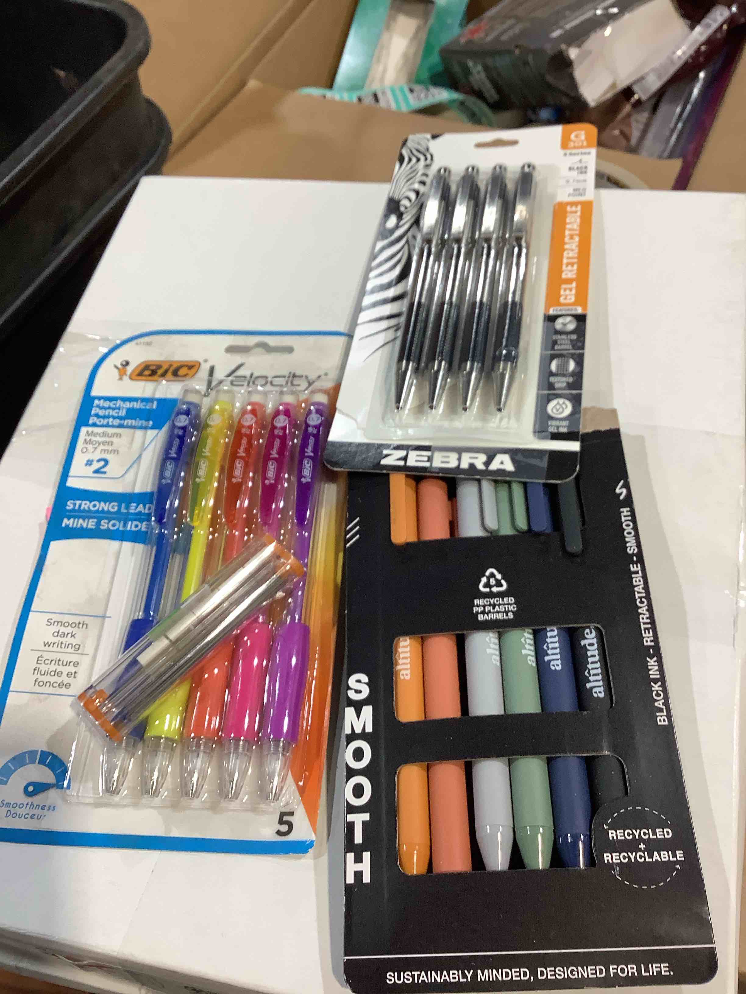 Assortment of pens of different colors and brands