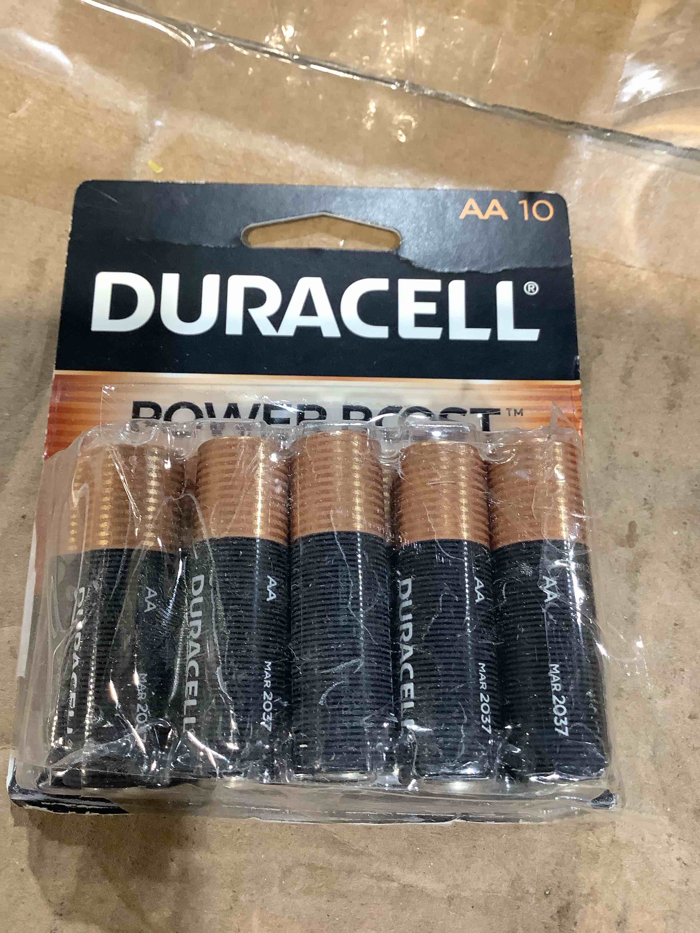 Condition photo showing New/Like New for duracell coppertop aa batteries - 10pk alkaline battery, in office