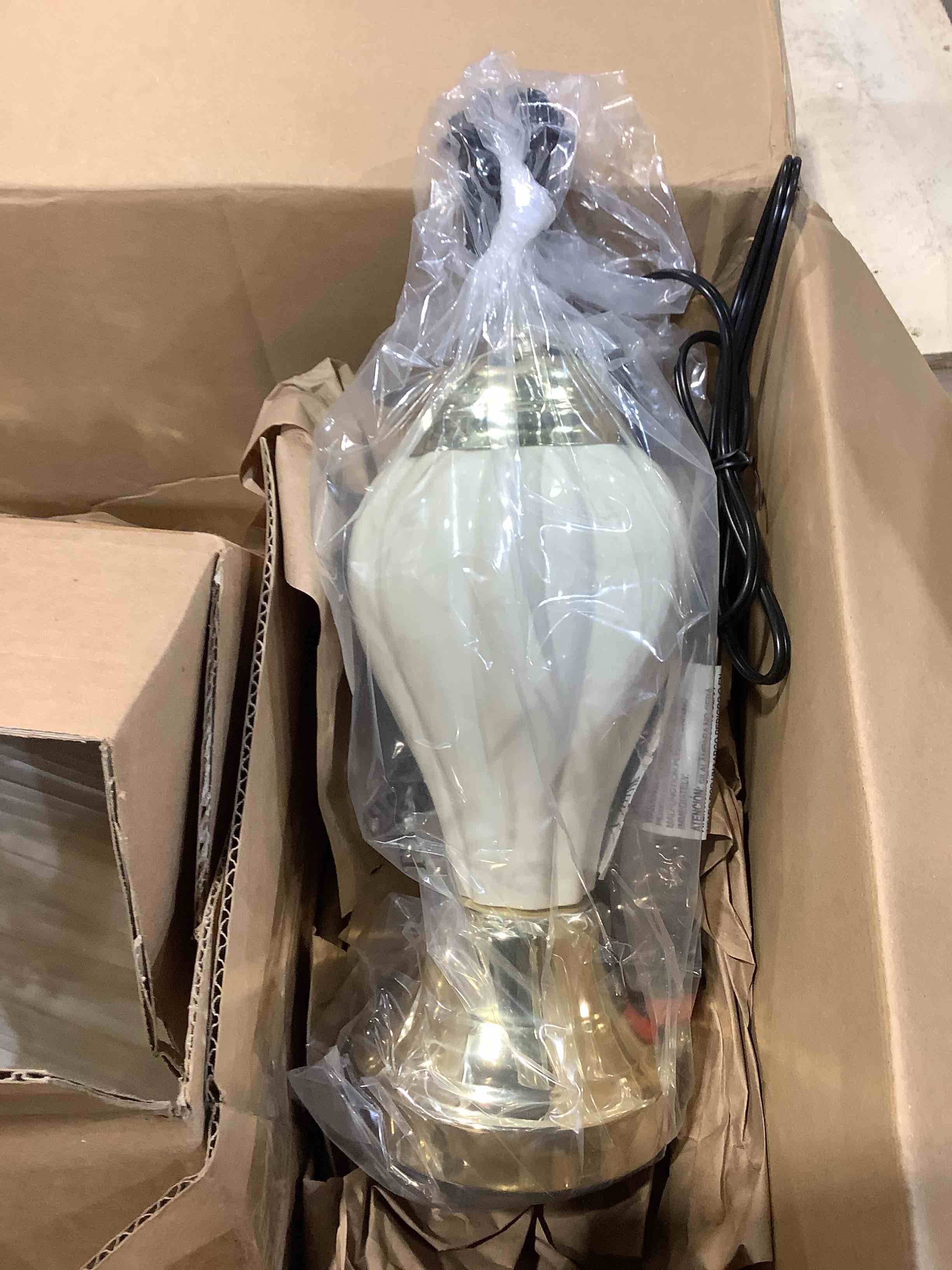 Condition photo showing New/Like New for 27" tall ceramic table lamp, urn-shaped with ivory finish, linen shade