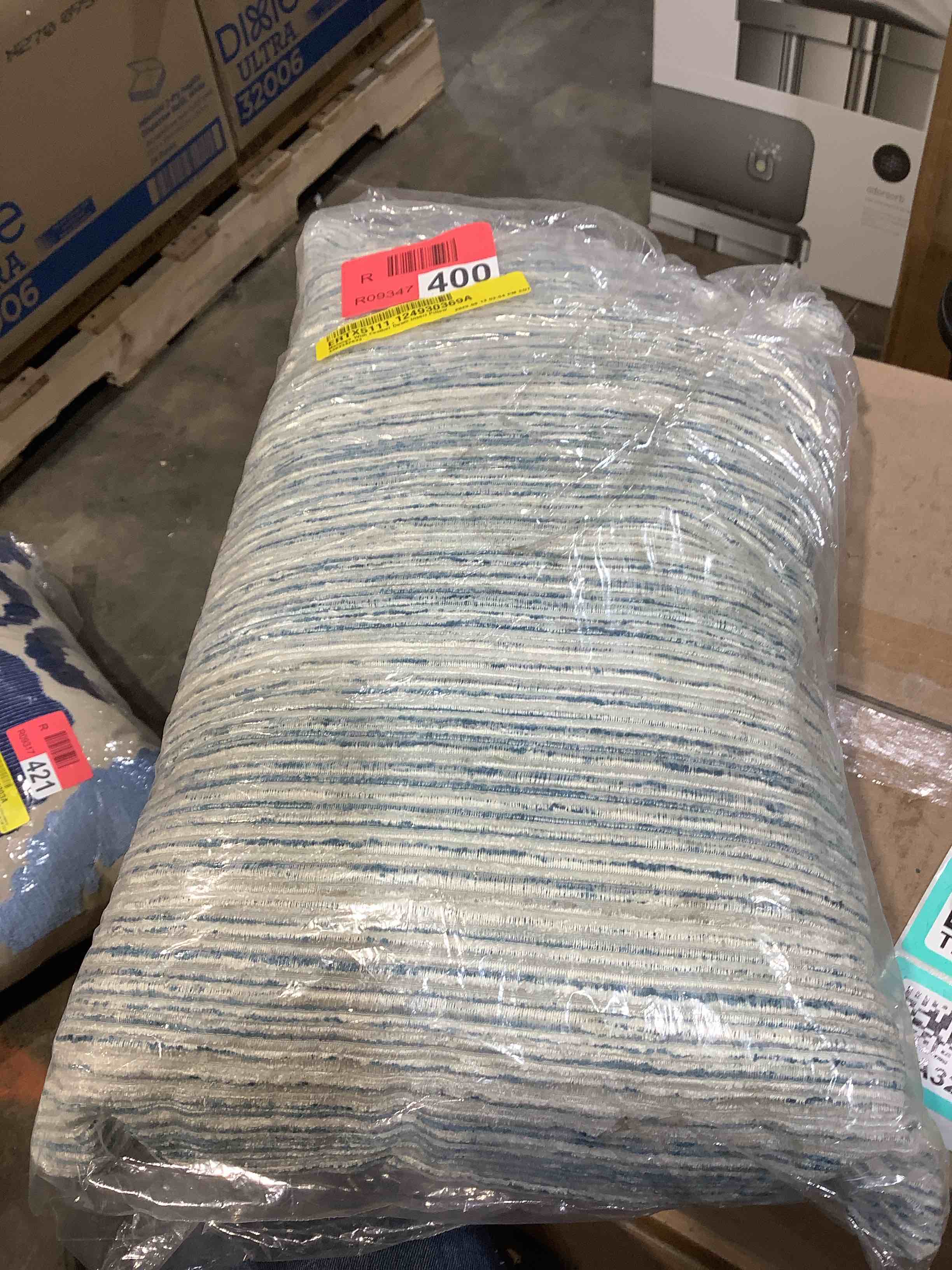 Condition photo showing New/Like New for melange with lumbar feather down insert 