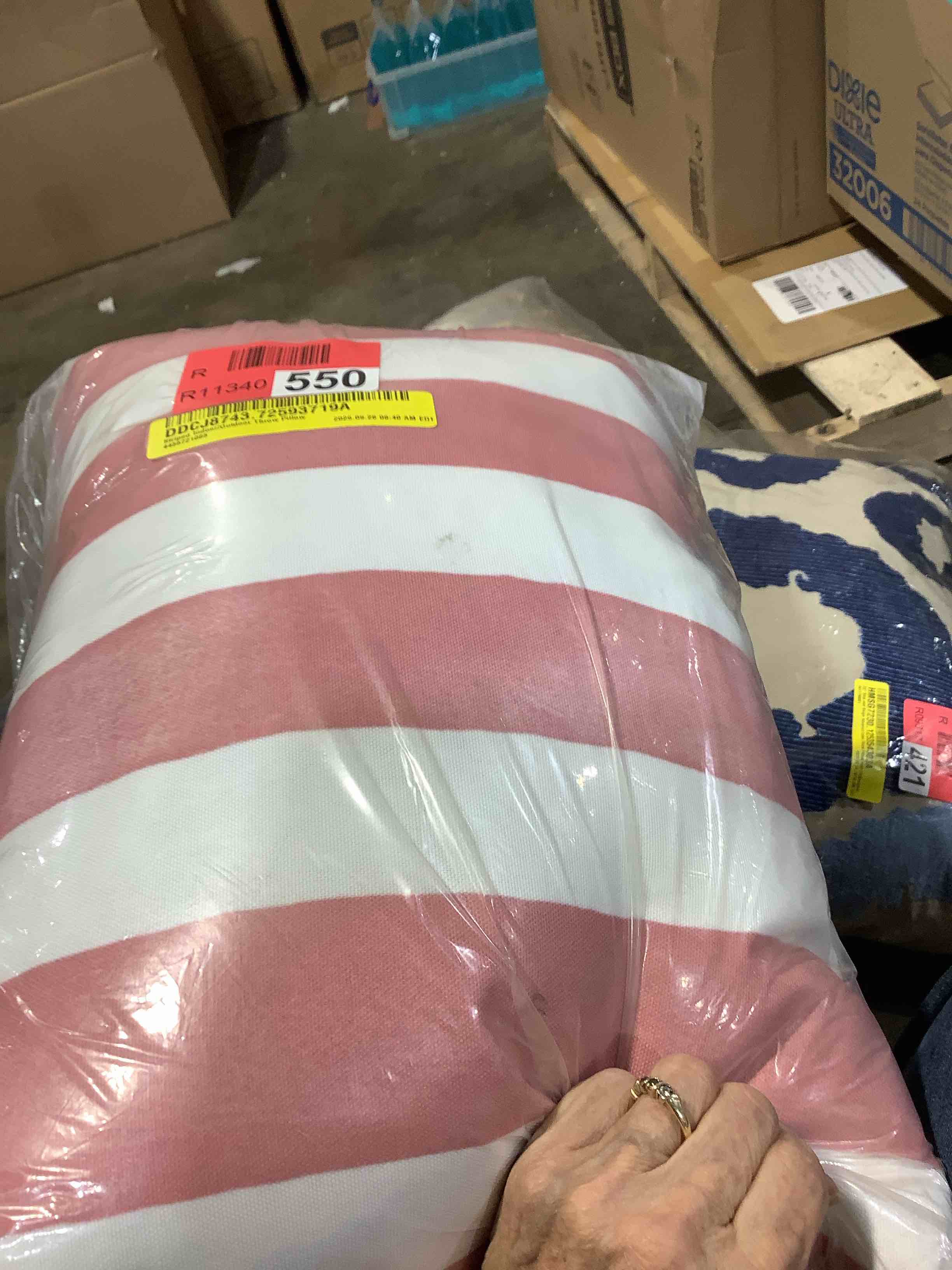 Condition photo showing New/Like New for striped pink and white indoor outdoor throw pillow