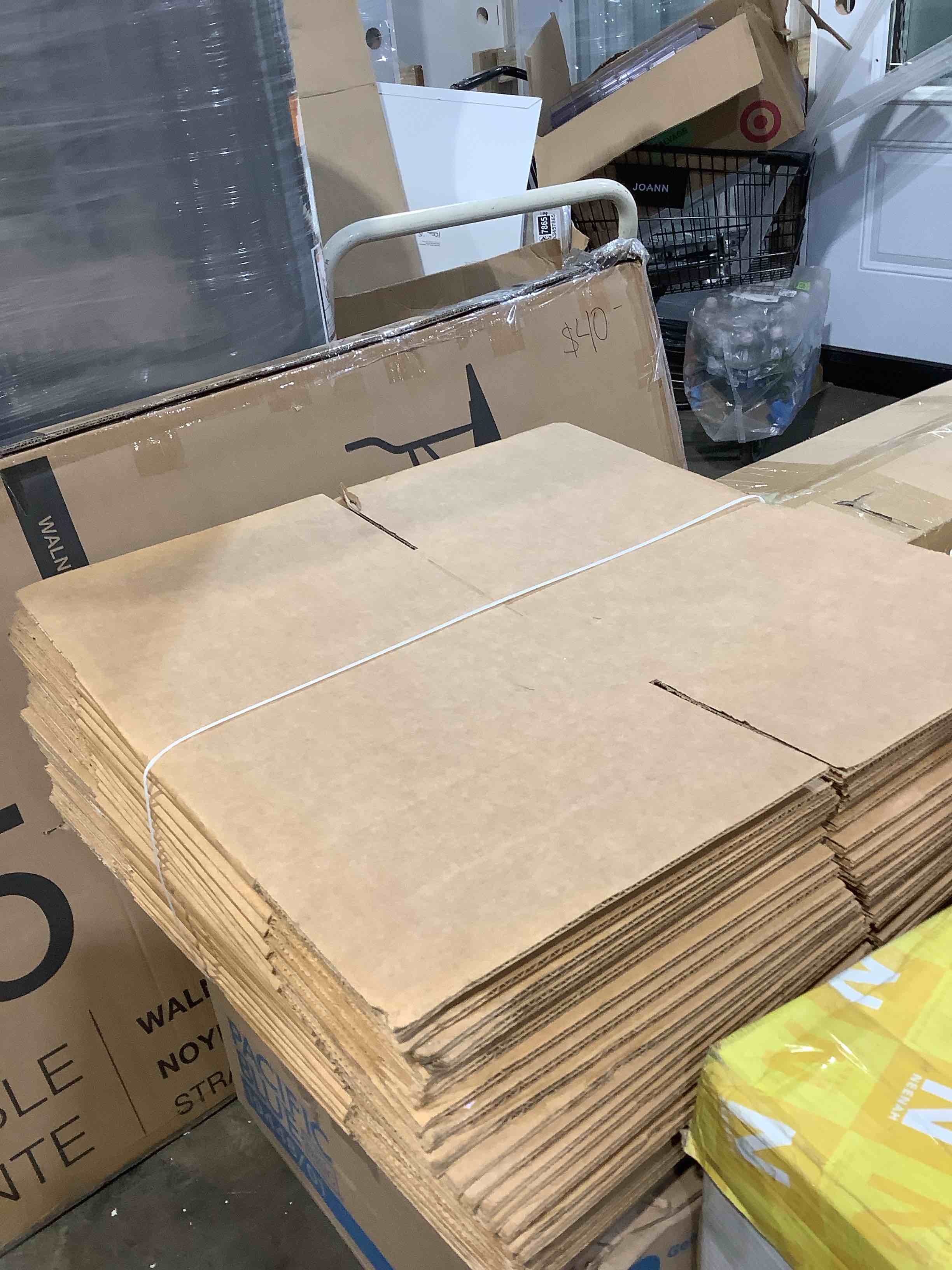 Condition photo showing New/Like New for 12" x 12" x 12" corrugated shipping boxes