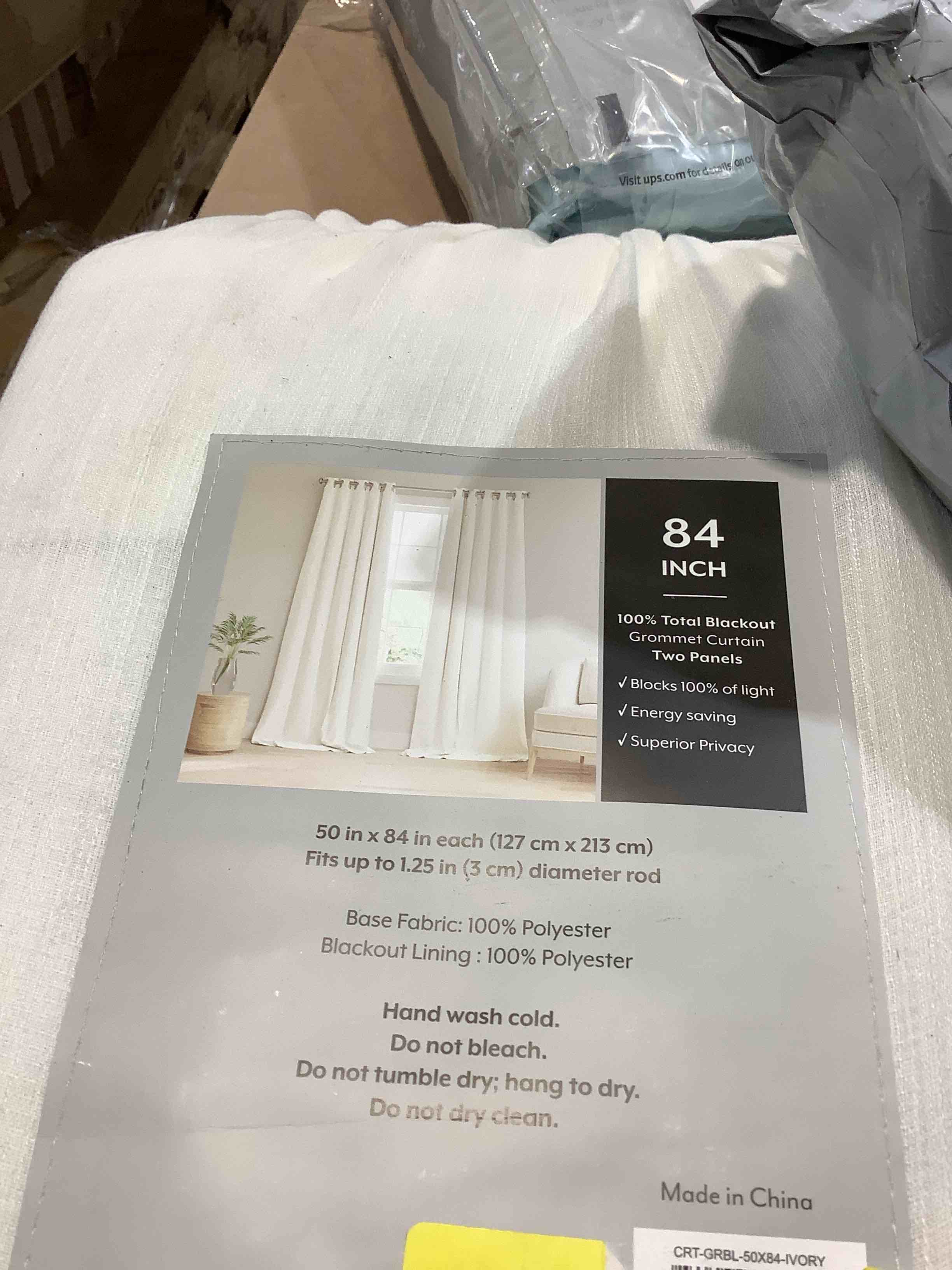 Condition photo showing New/Like New for ienjoy home home collection 2 panel 100% total blackout 2 piece grommet curtains set, 50" x 84"