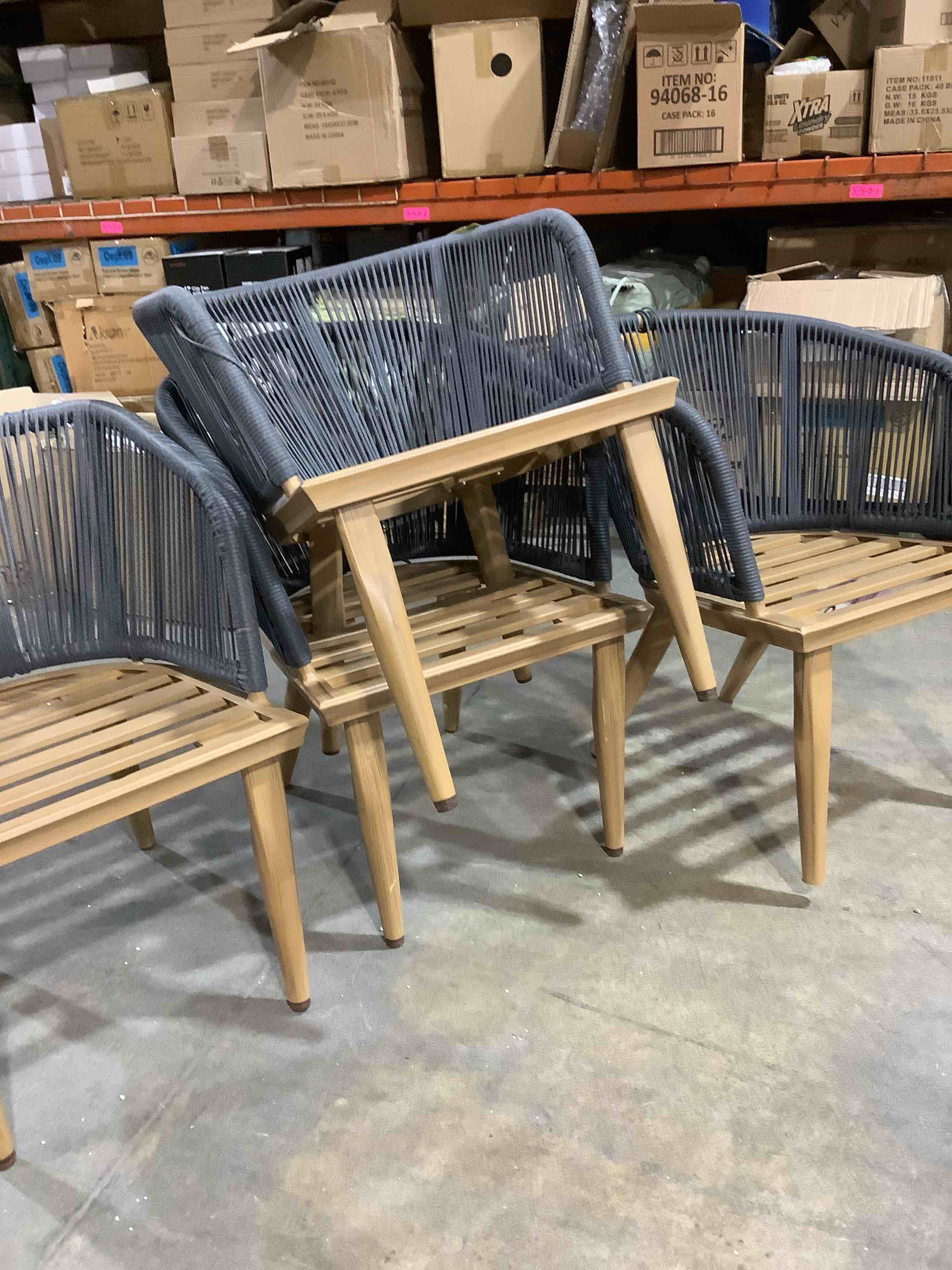 Condition photo showing Good Condition for outdoor set of four dining metal chairs with armrest and rope rattan piping