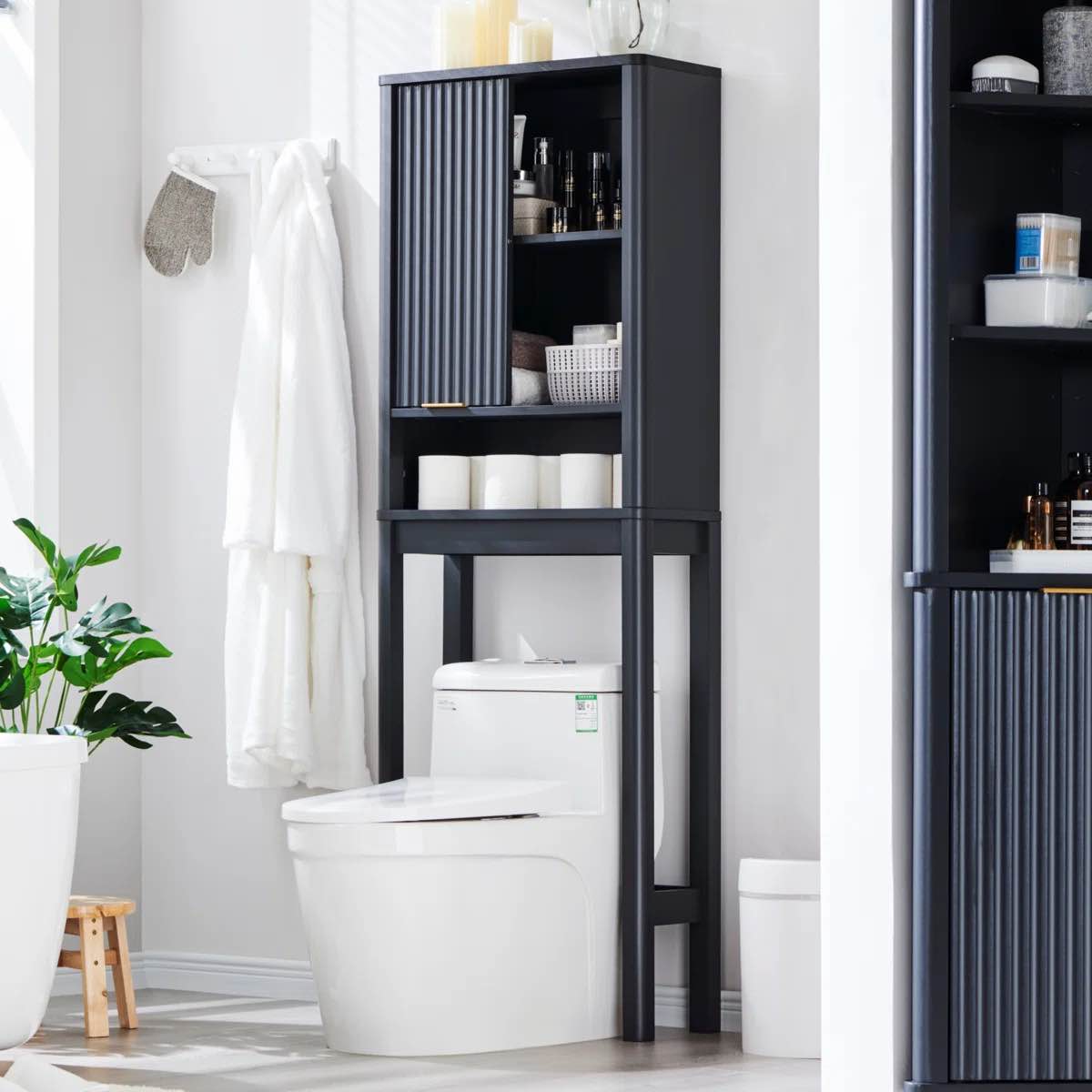 Riccio Freestanding Over The Toilet Storage Cabinet with Sliding Fluted Door Adjustable Shelf