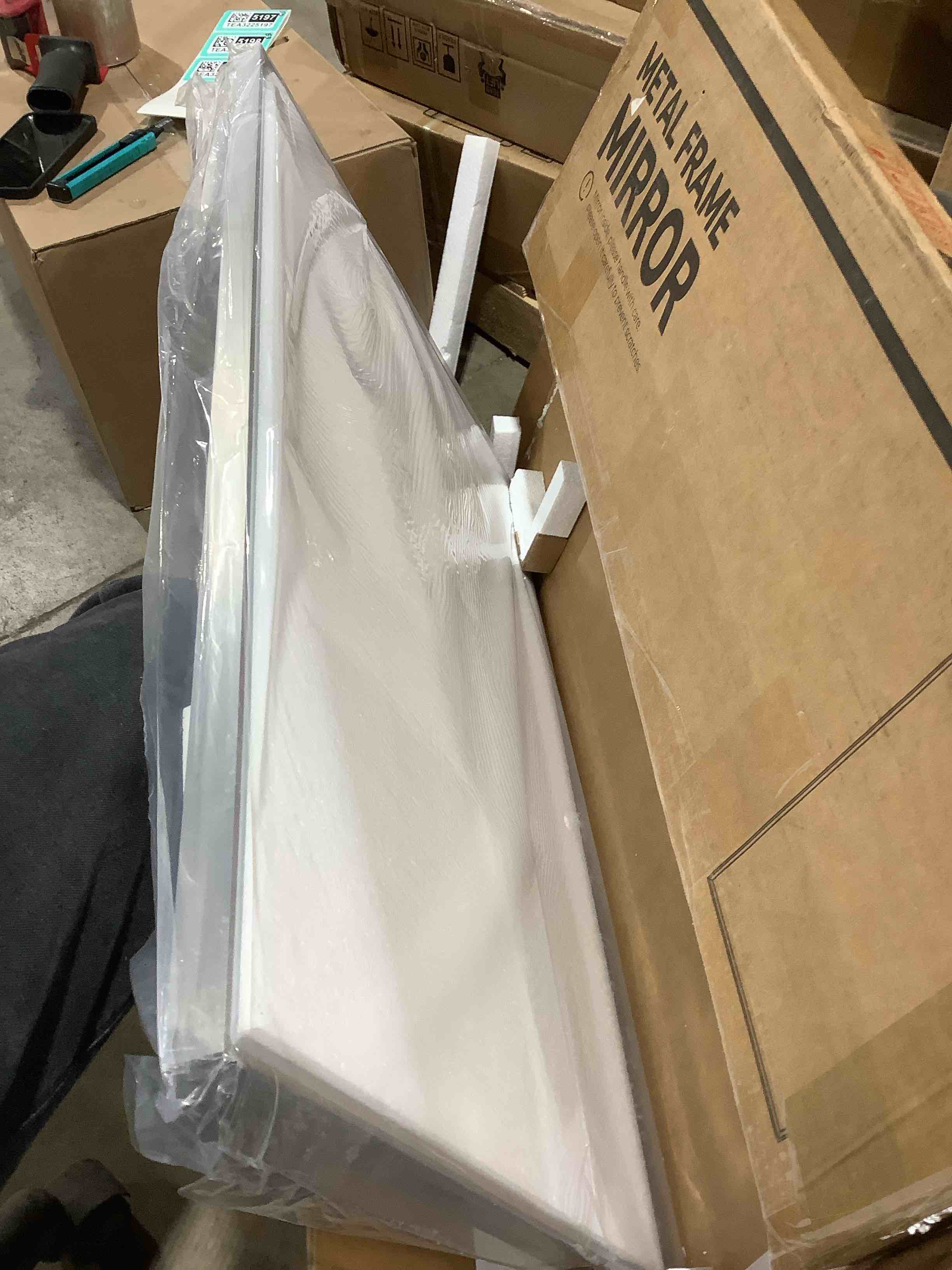 Condition photo showing New/Like New for Brushed nickel metal frame mirror