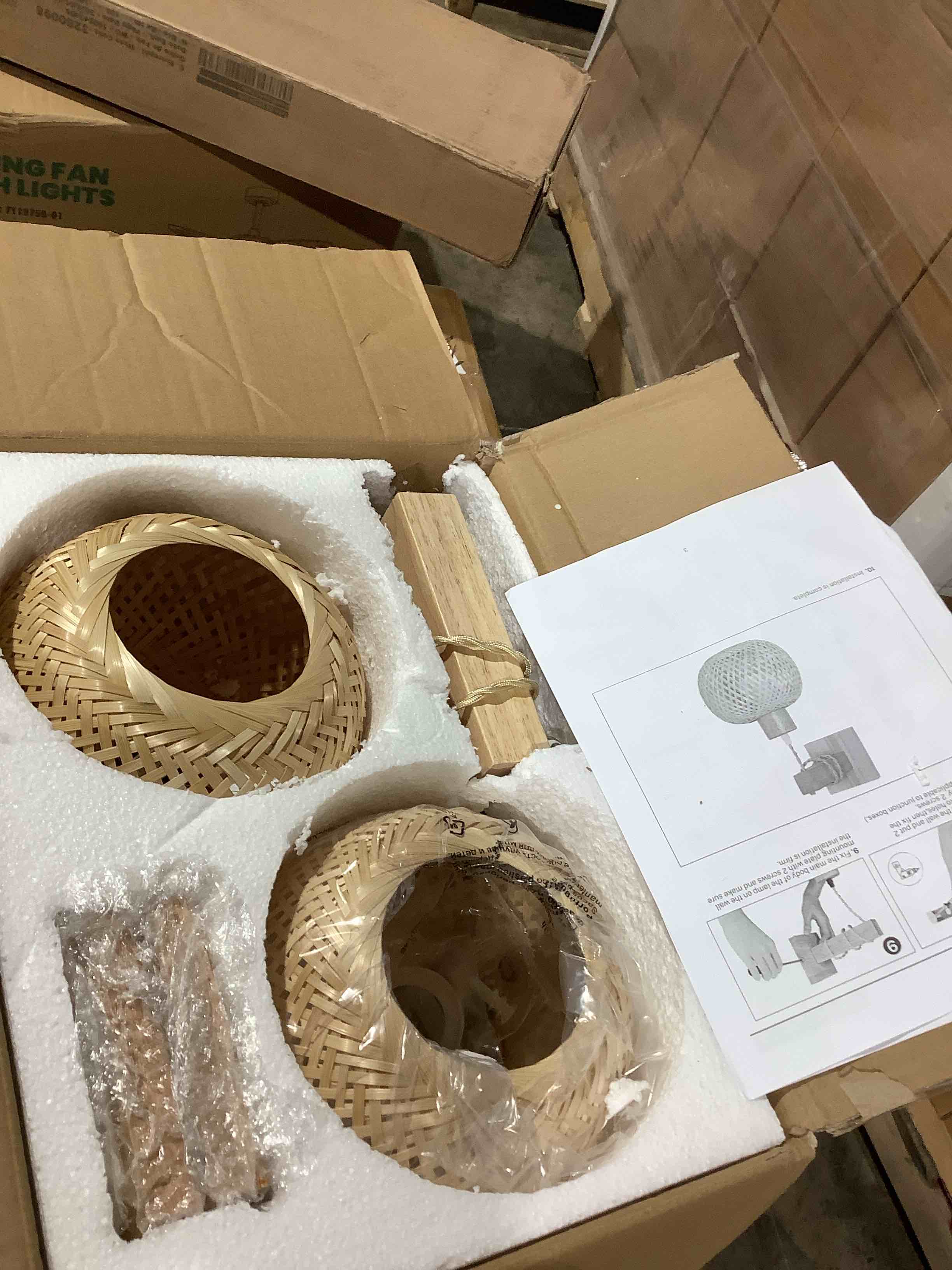 Condition photo showing New/Like New for ANNIEK rattan armed round sconces, set of 2