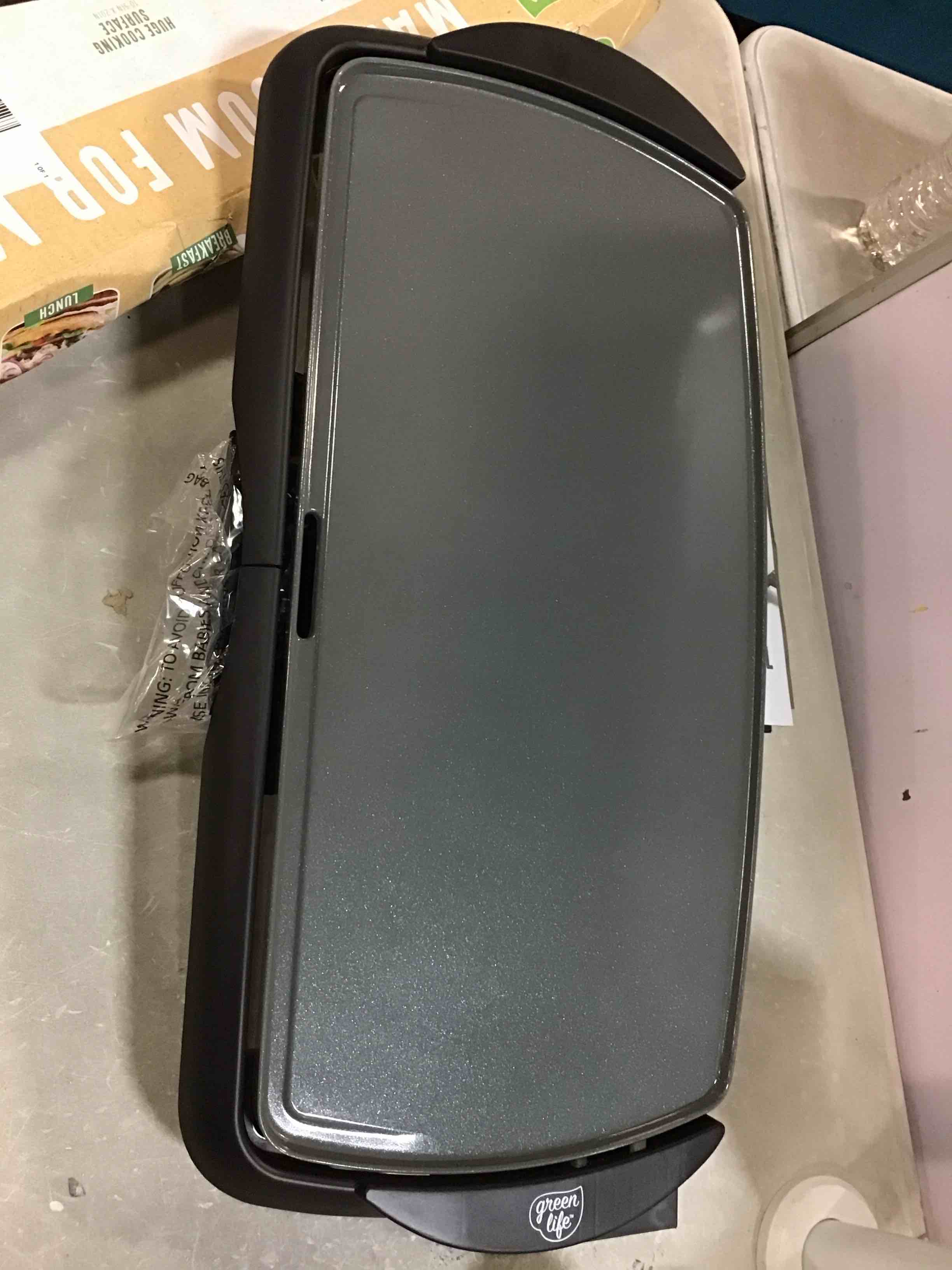 Condition photo showing As Is for greenlife 20" electric griddle, extra large surface for pancakes eggs fajitas, healthy ceramic nonstick coating, stay cool handles, removable drip tray, temperature control, pfas-free, black