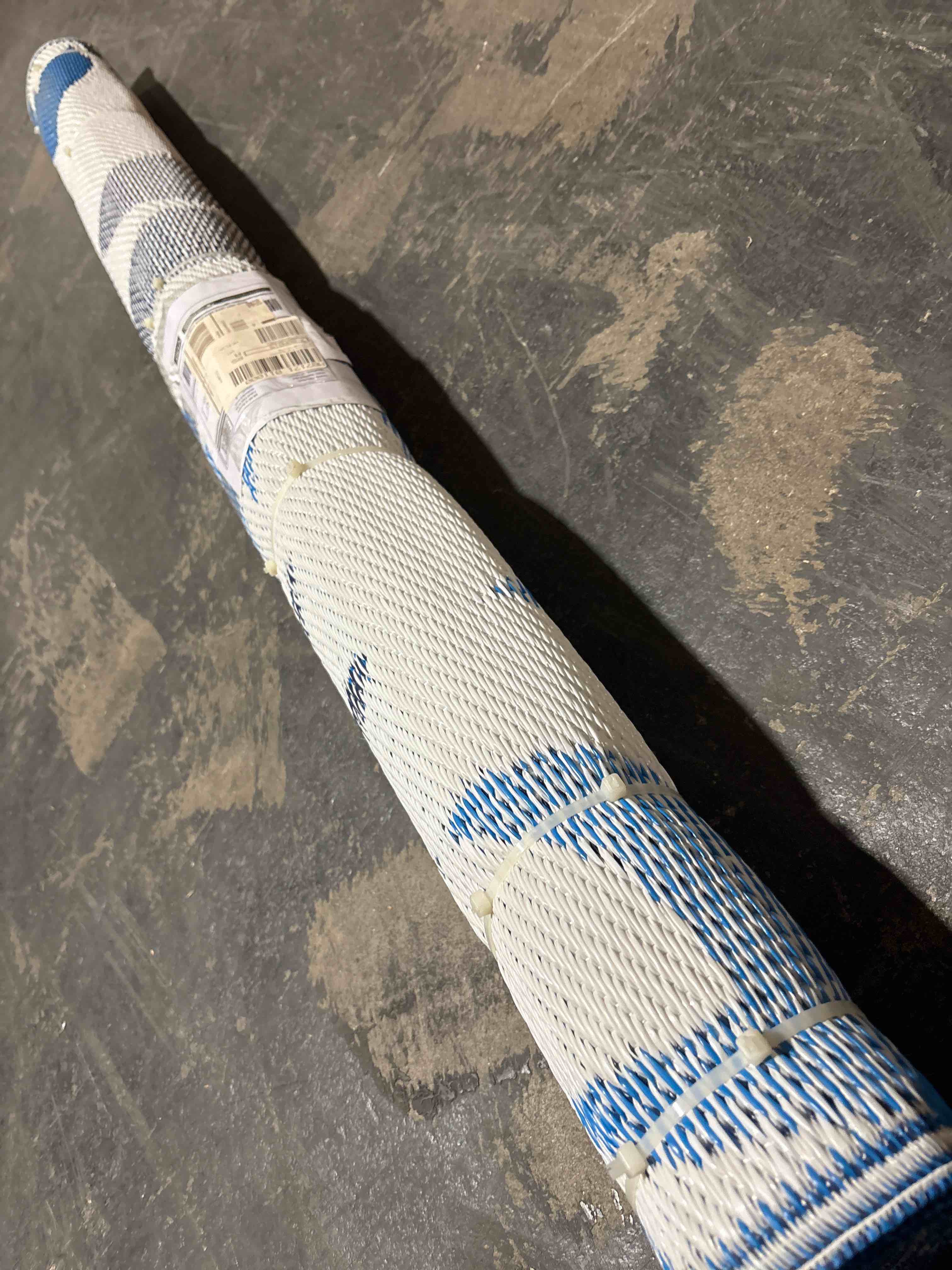 Condition photo showing New/Like New for Barbara king 5’x8’ reversible dahlia flower patio mat, blue