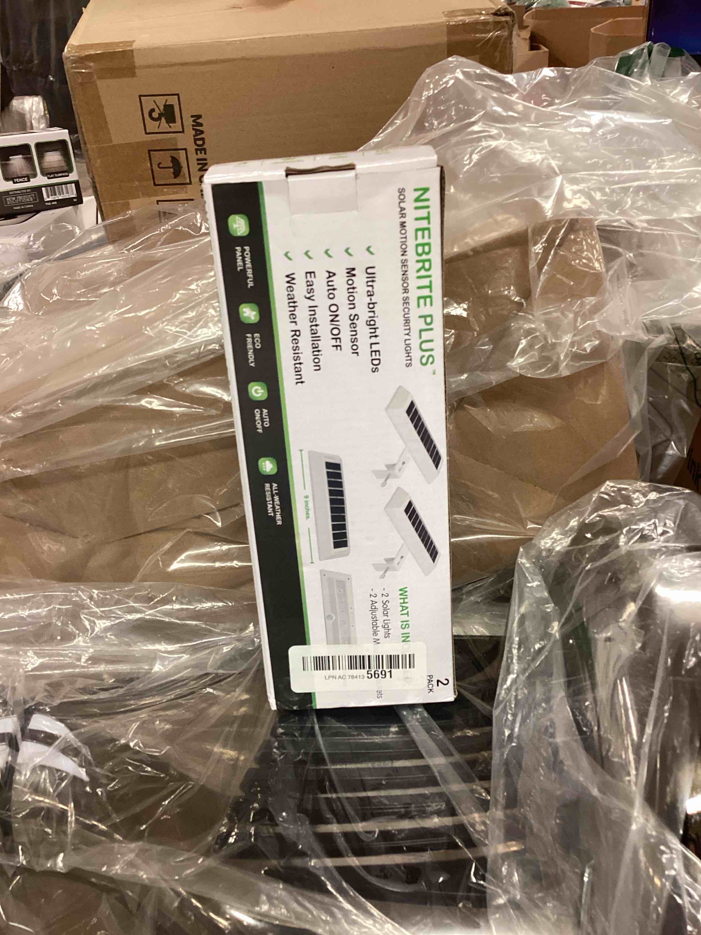 Condition photo showing New/Like New for TOUCHOFECO Nitebrite Solar LED Motion Detector Sensor Utility Security Outdoor Accent Lights -Automatic On/Off Weather Resistant Mount to Gutter or Fence 2 Pack