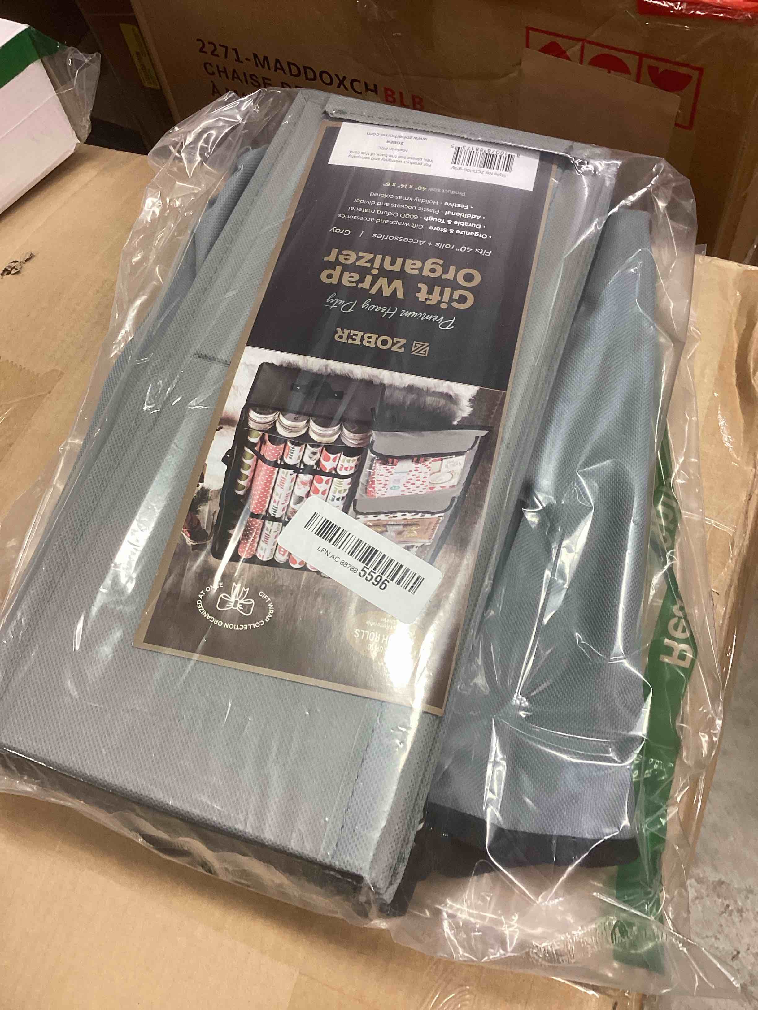 Condition photo showing New/Like New for ZOBER Gift Wrapping Paper Organizer Storage - 40" Gift Wrap Storage Containers with Interior Pockets for Bows, Tags & Ribbons - Wrapping Paper Holder, 600D Oxford, Fits 24 Standard Rolls, Gray/Black Grey