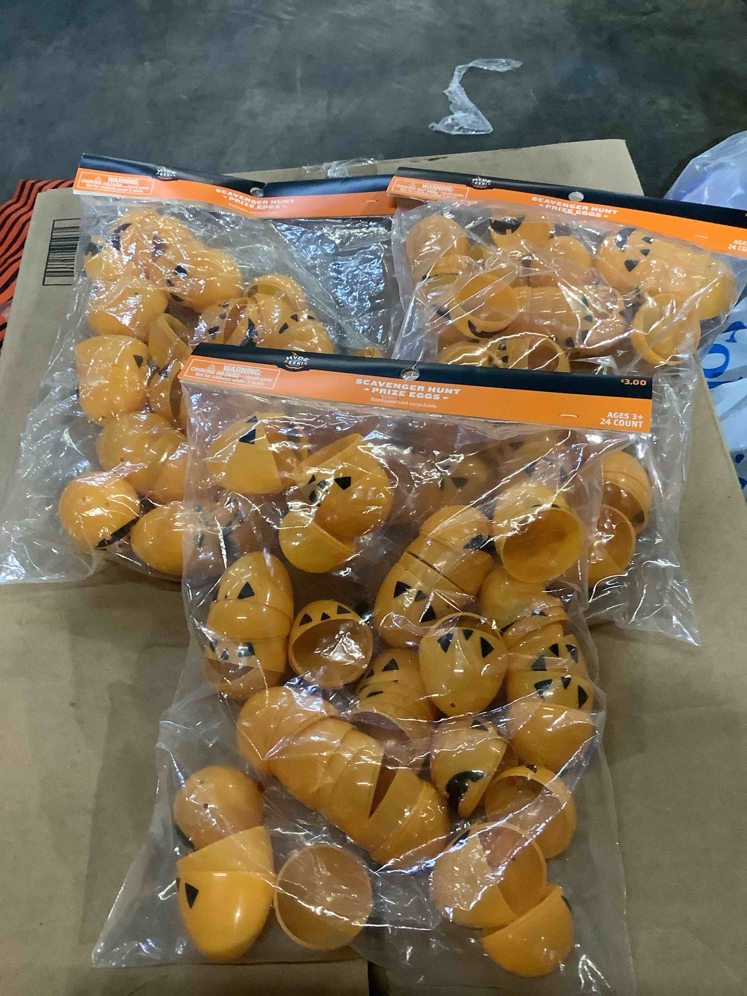 24ct orange fillable eggs for halloween egg hunt - hyde & eek! boutique™: indoor party decor, 2.33" height