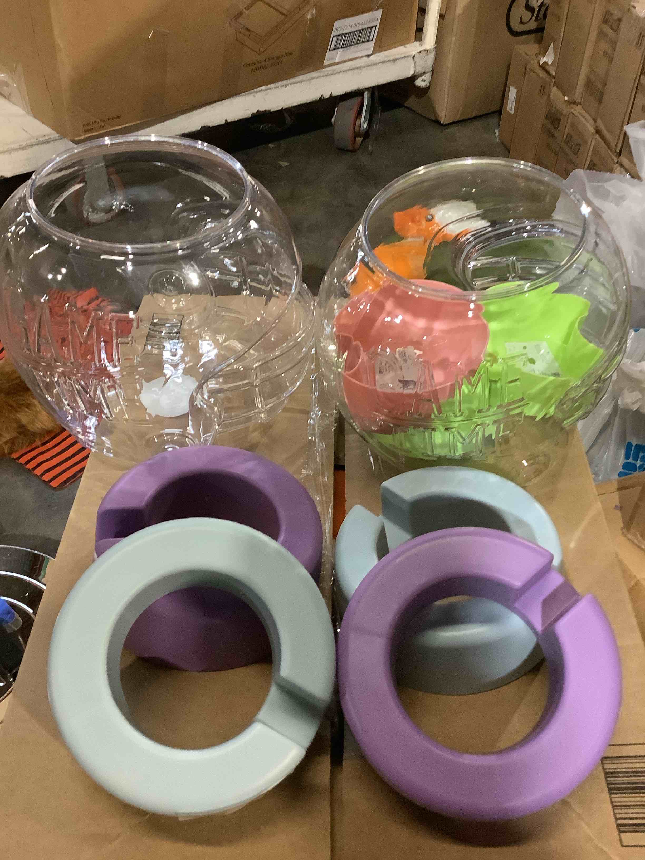 assortment of water bottle snack bowls and two game time helmet, snack balls
