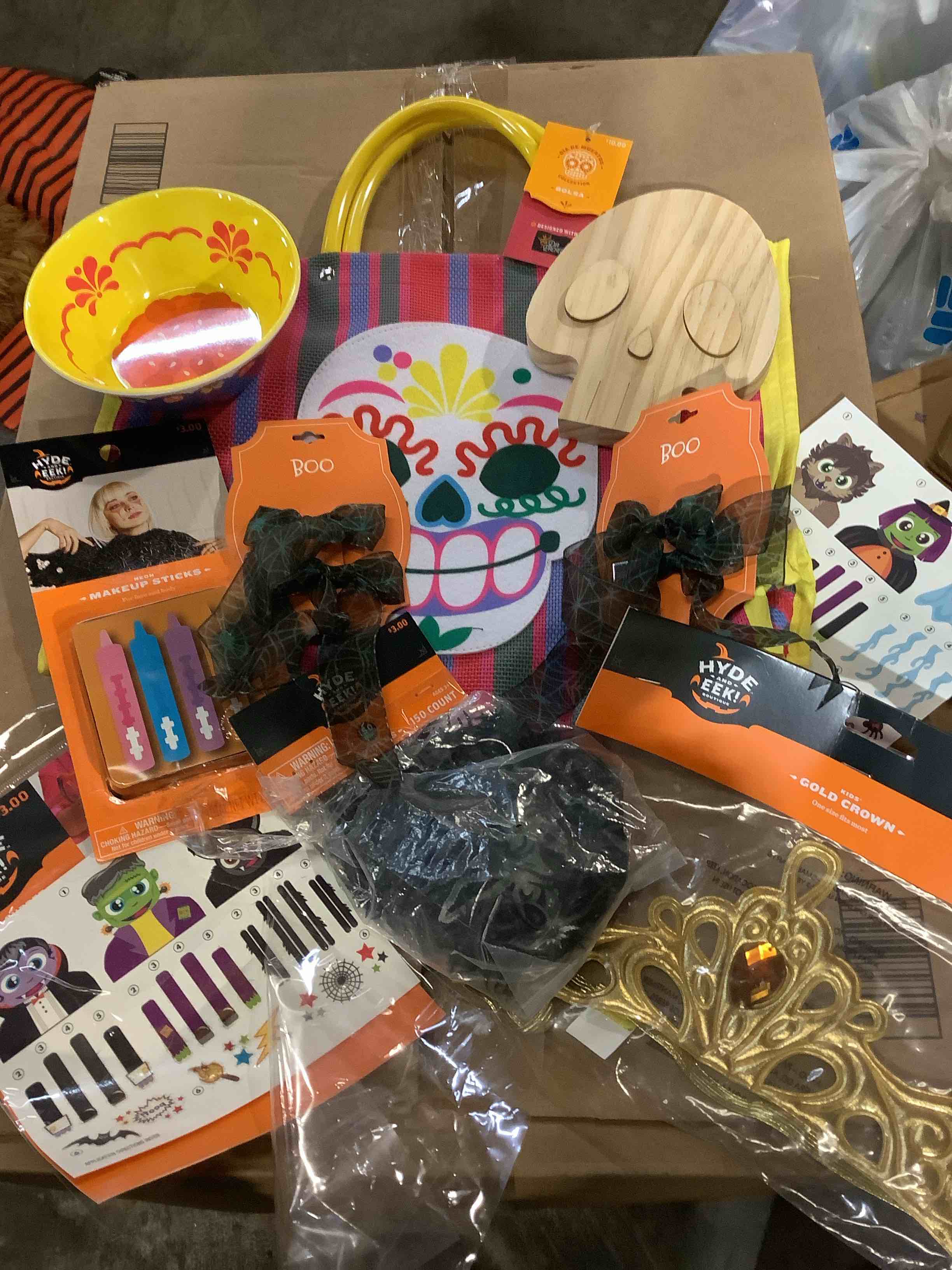 assortment of Halloween decorations and personal items