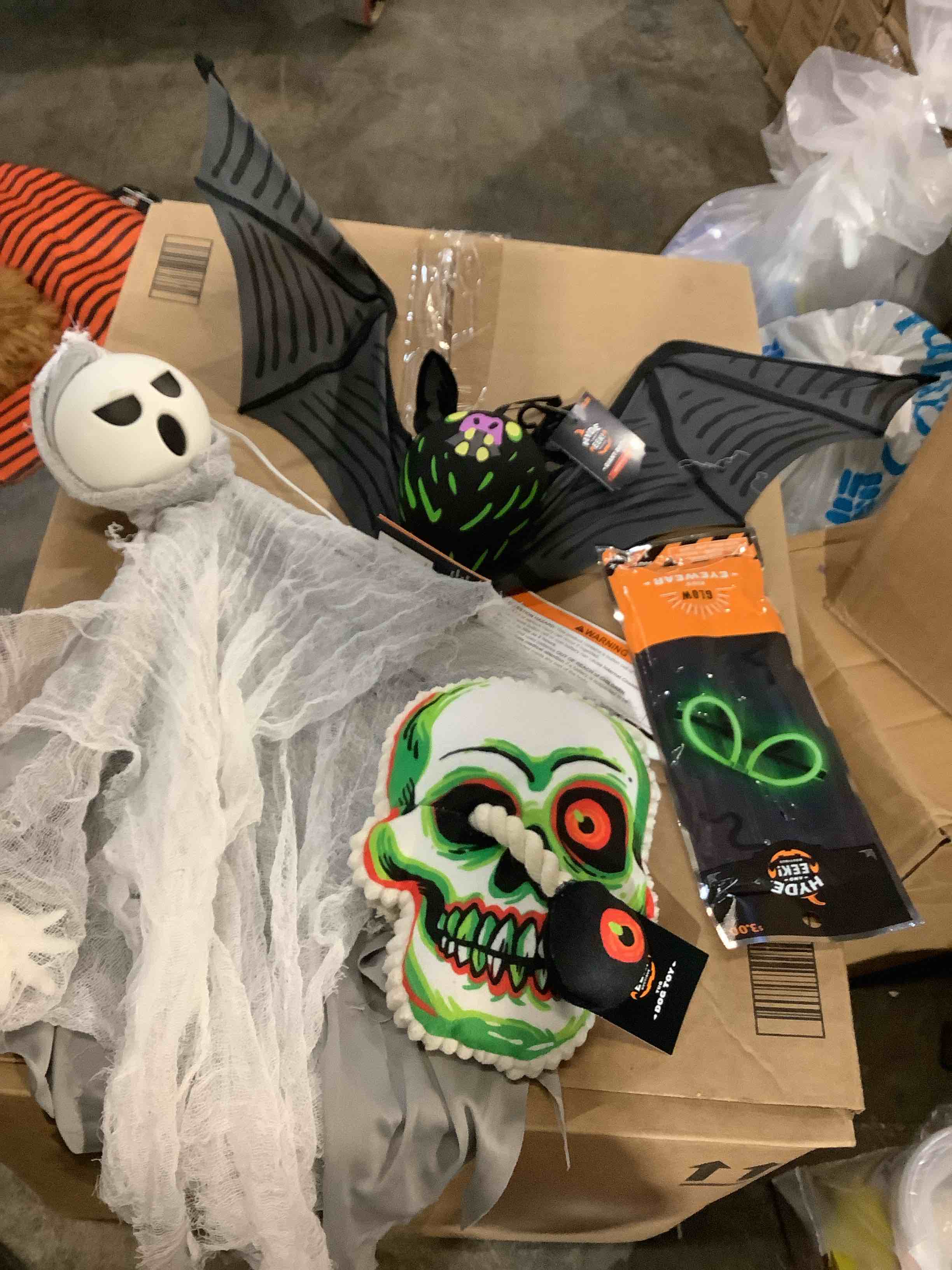 A assortment of Halloween decoration and dog toy