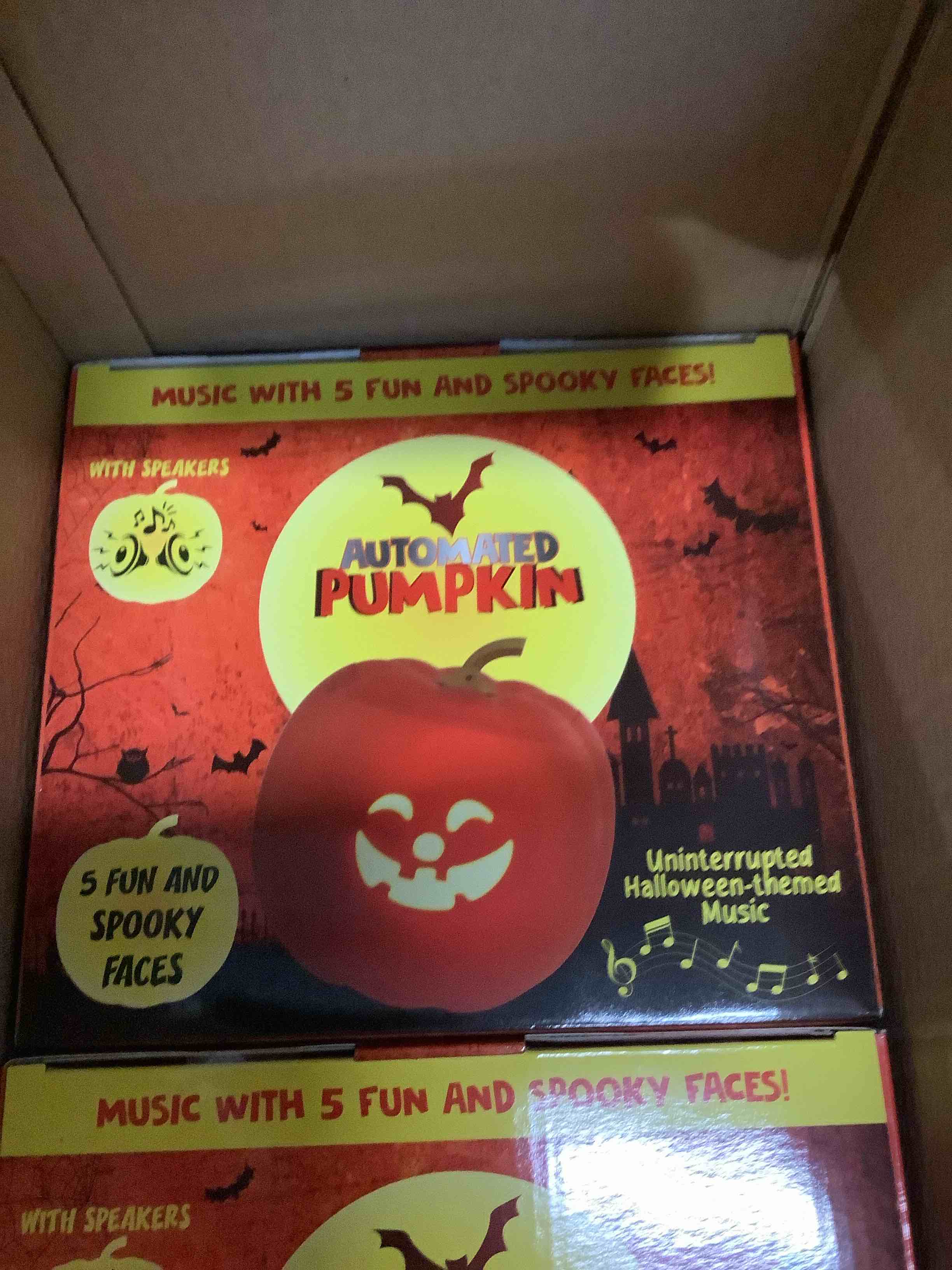 Automated pumpkin with five fun and spooky faces
