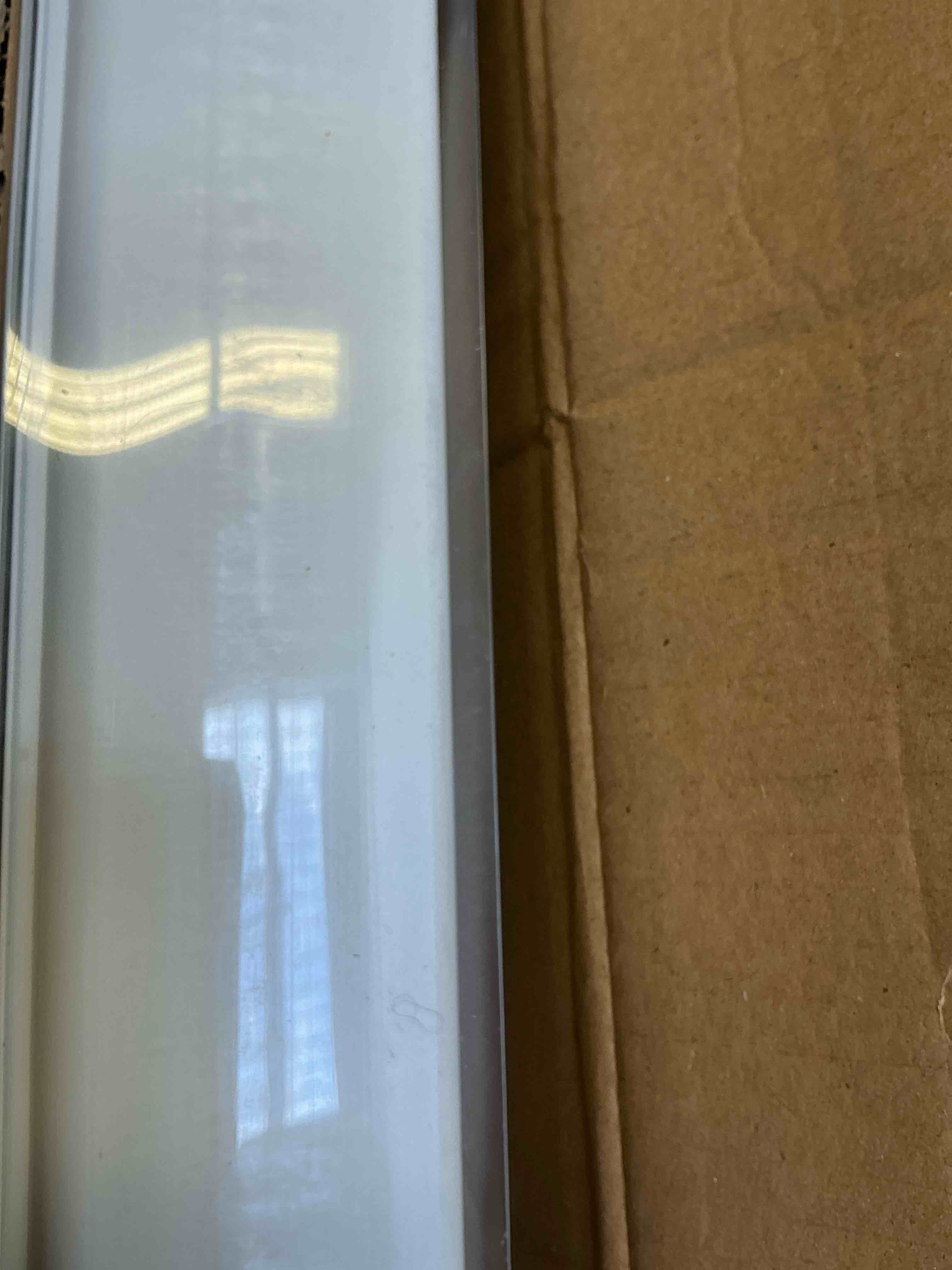 Condition photo showing As Is for white cordless room darkening vinyl blinds with 2 in. slats - 52 in. w x 72 in. l