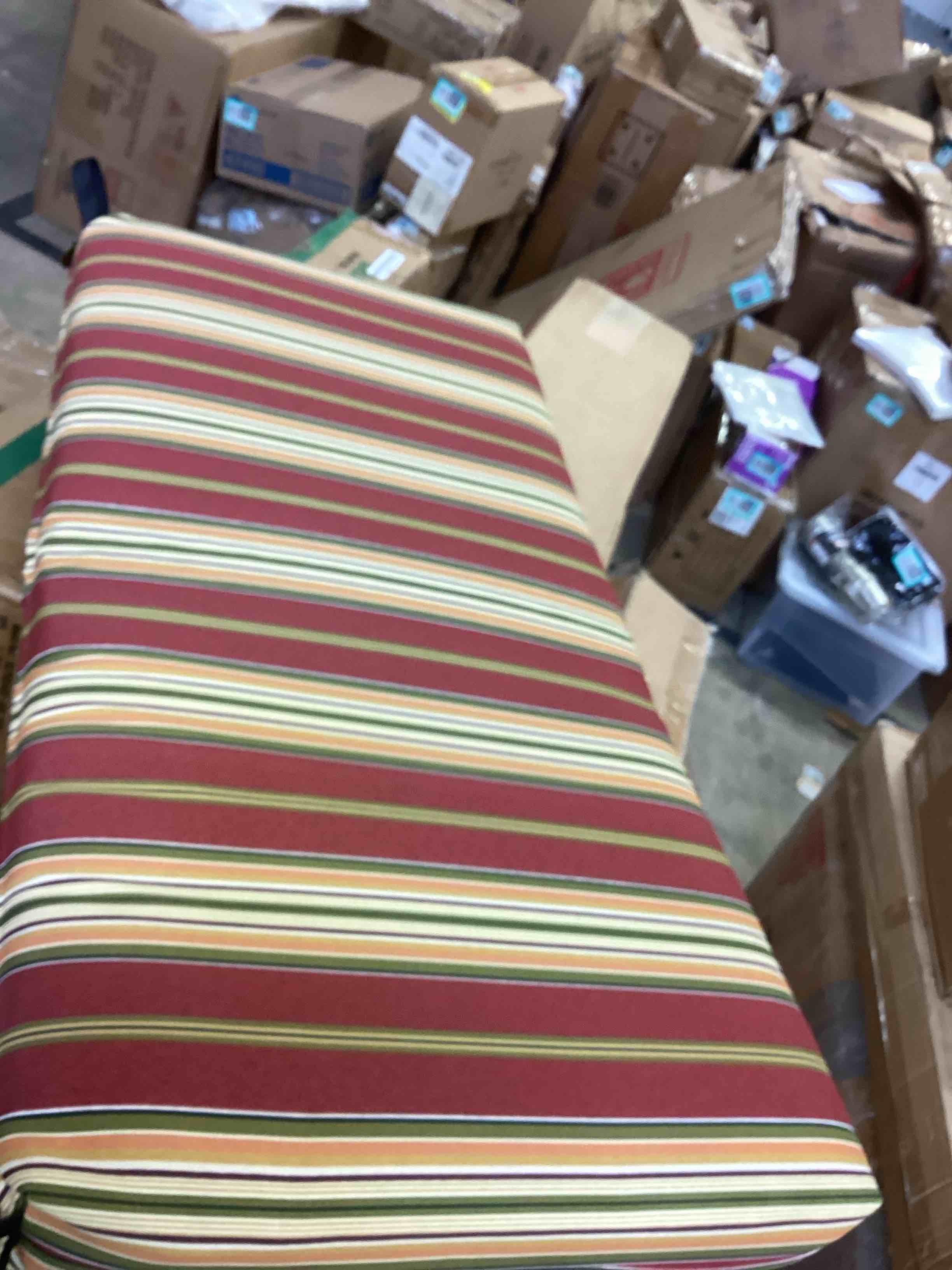 Condition photo showing New/Like New for blazing needles  outdoor bench cushion