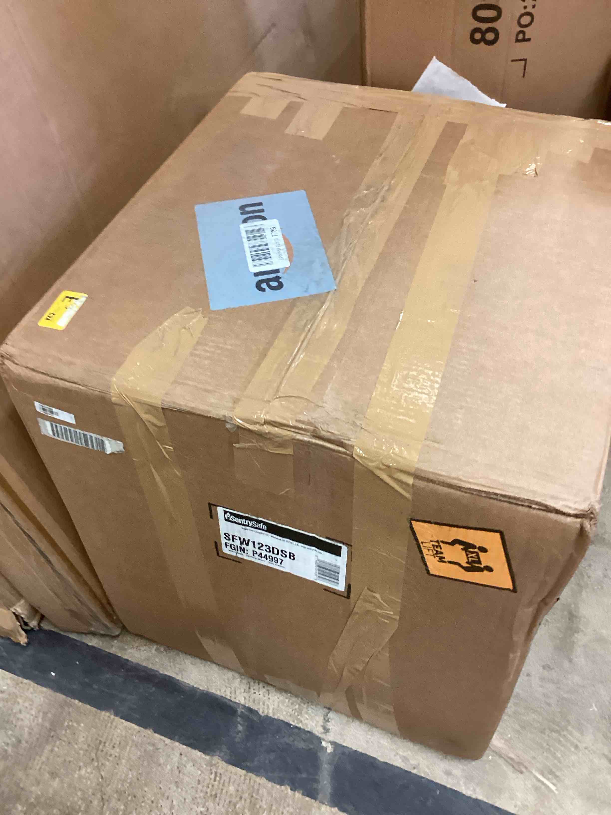 Condition photo showing Good Condition for sentrysafe sfw123dsb fireproof safe and waterproof safe with dial combination 1.23 cubic feet gray (incomplete missing keys)