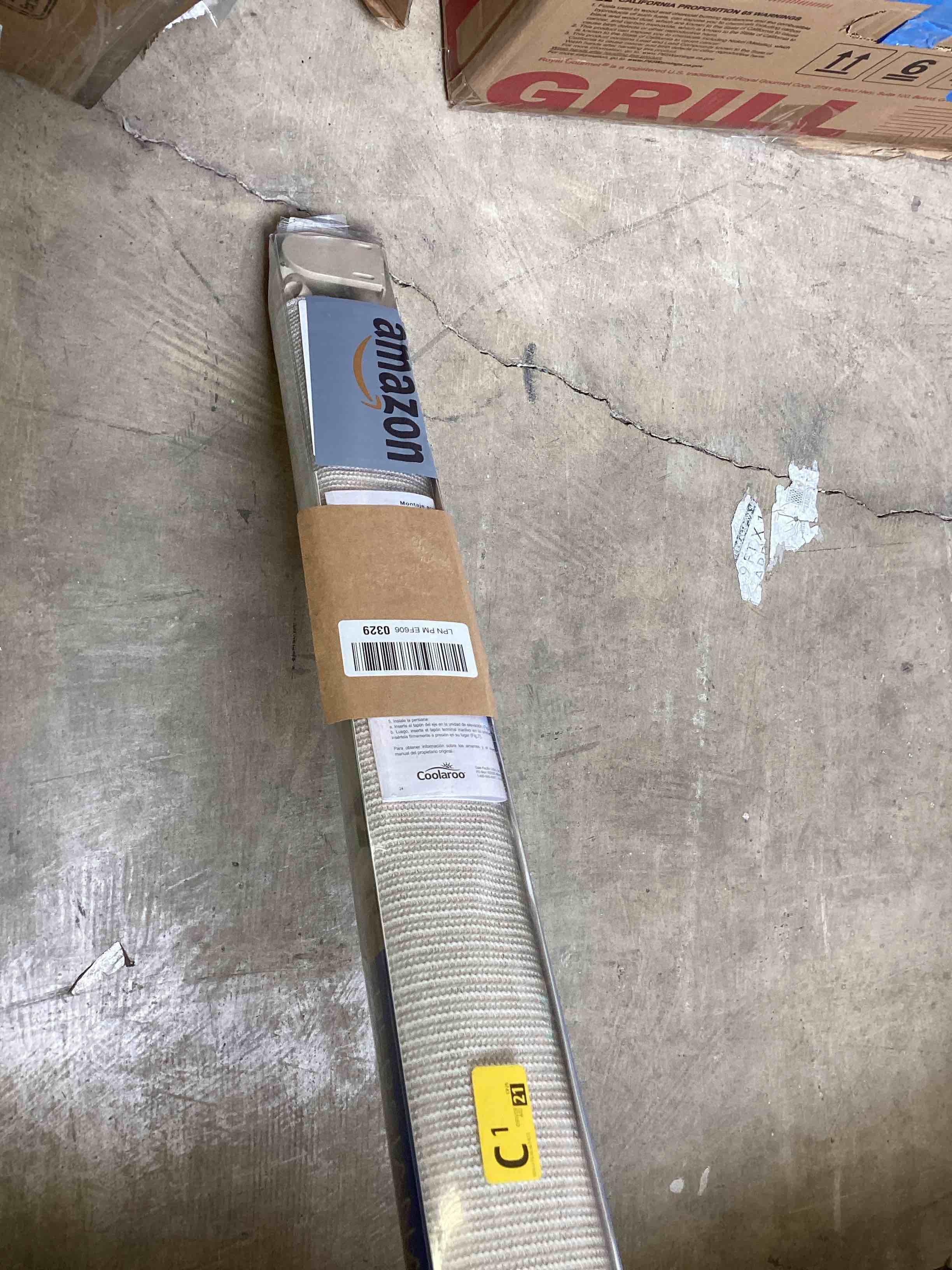 Condition photo showing New/Like New for coolaroo 474829 outdoor roller shade, (6' w x 8' l), pebble