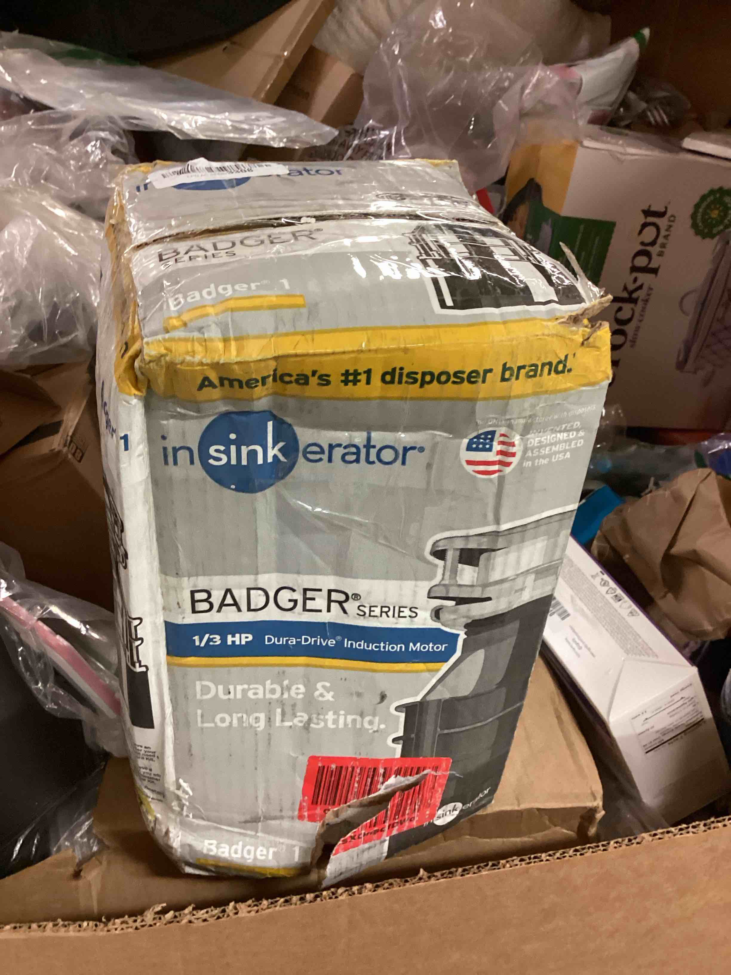 Condition photo showing As Is for insinkerator garbage disposal, badger 1, standard series, 1/3 hp continuous feed, black, waterborne grey enamel
