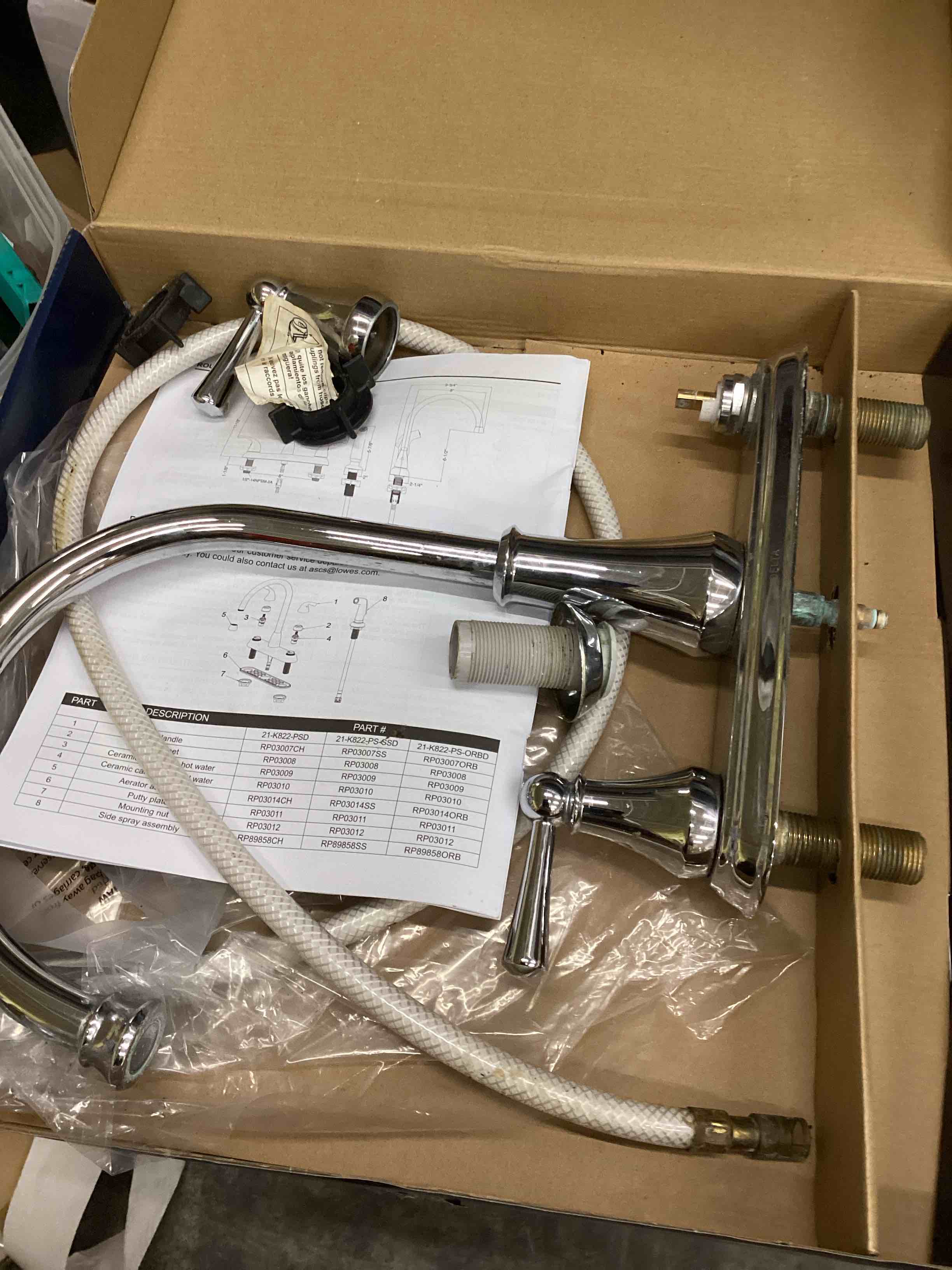Condition photo showing As Is for project source everfield chrome double handle deck-mount kitchen faucet (includes deck plate) (includes side sprayer)