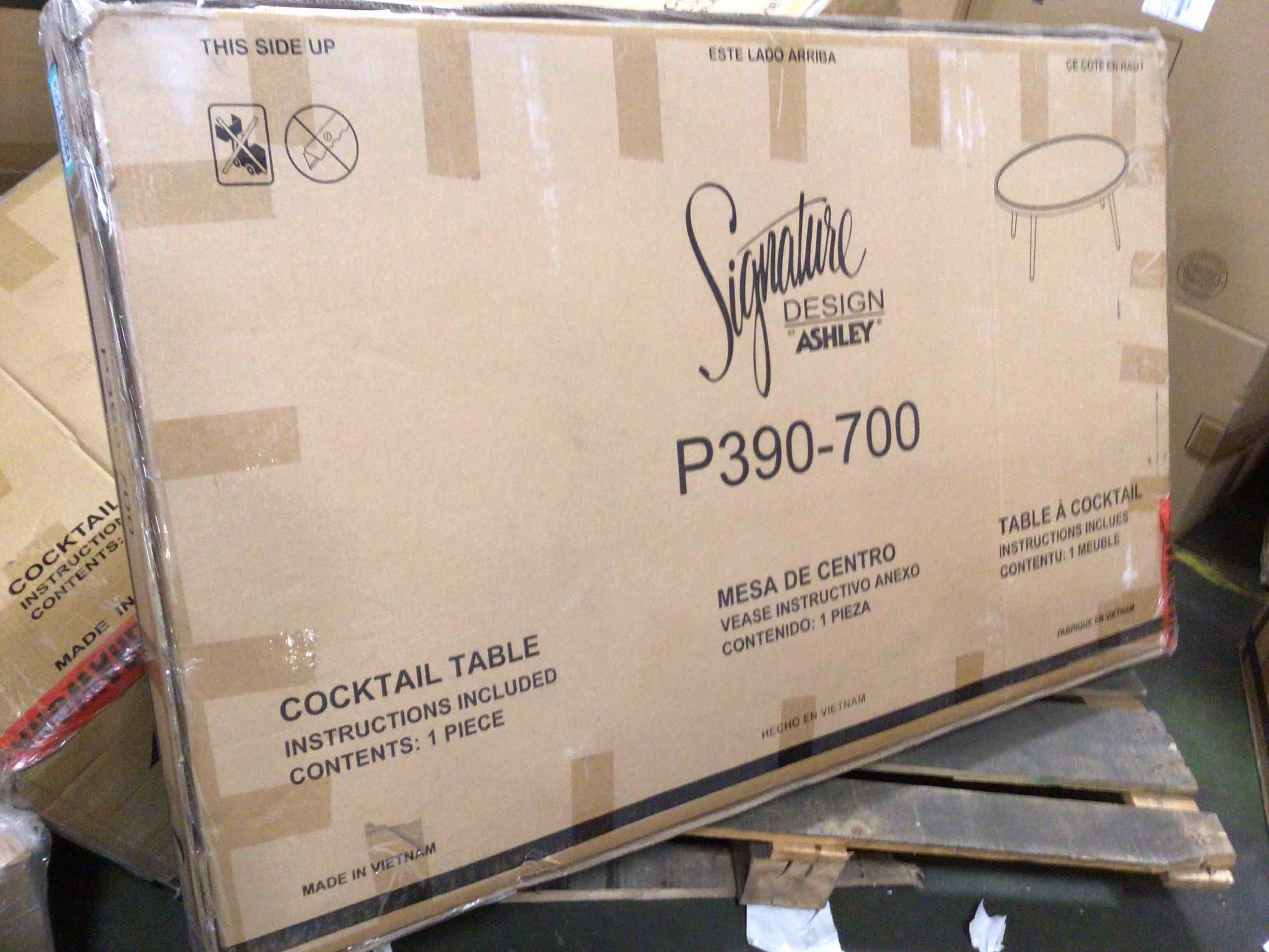 Condition photo showing New/Like New for cocktail table