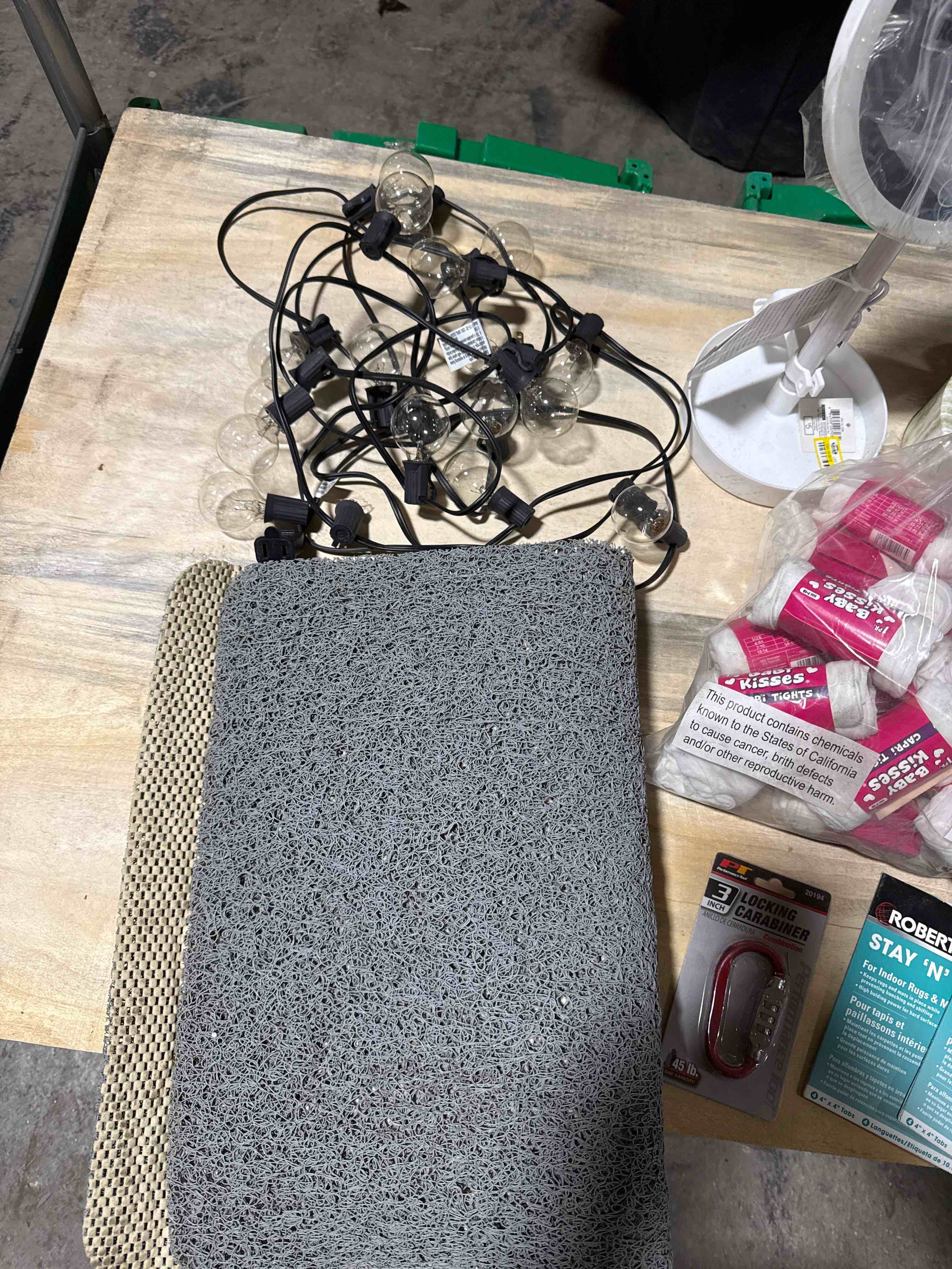 Condition photo showing As Is for assorted products: table lamp, bath mat, mirror, hygiene 