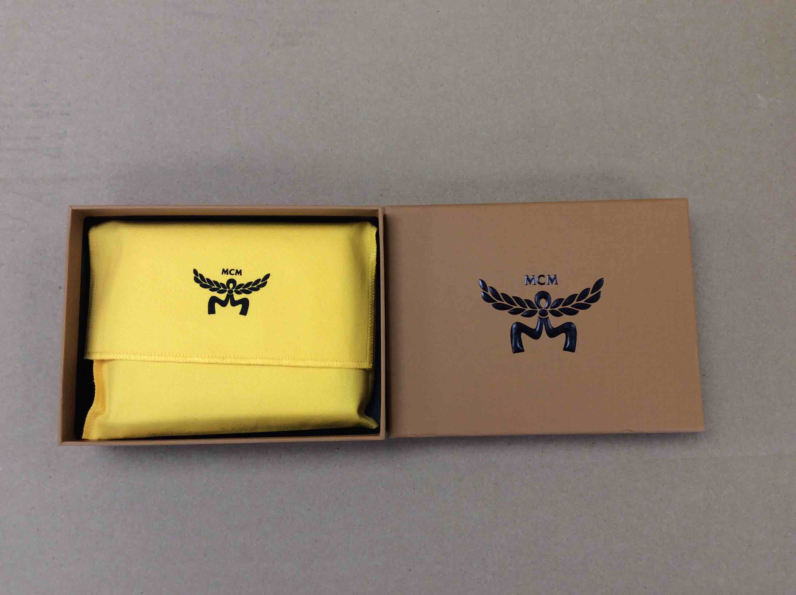 Condition photo showing New/Like New for mcm visetos original coated canvas bifold wallet in black