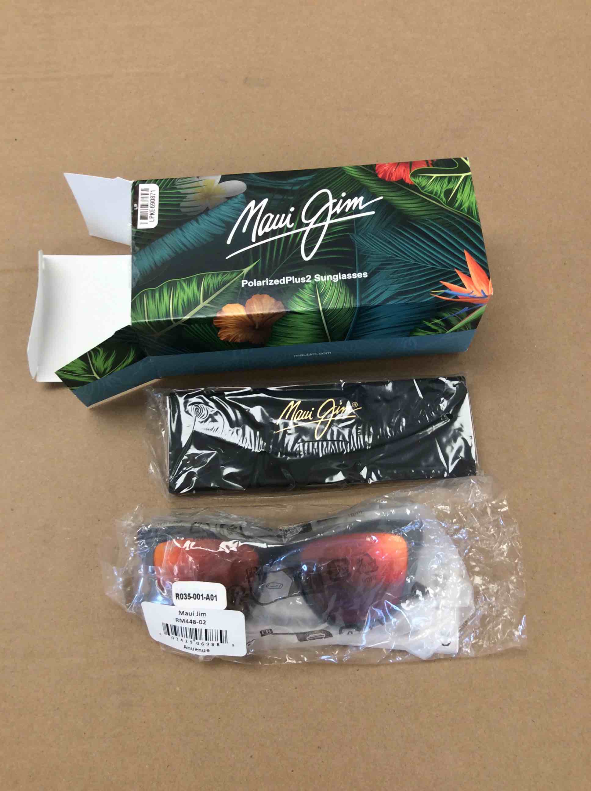 Condition photo showing New/Like New for maui jim anuenue 52mm polarizedplus2® sunglasses in black gloss/hawaii lava at nordstrom