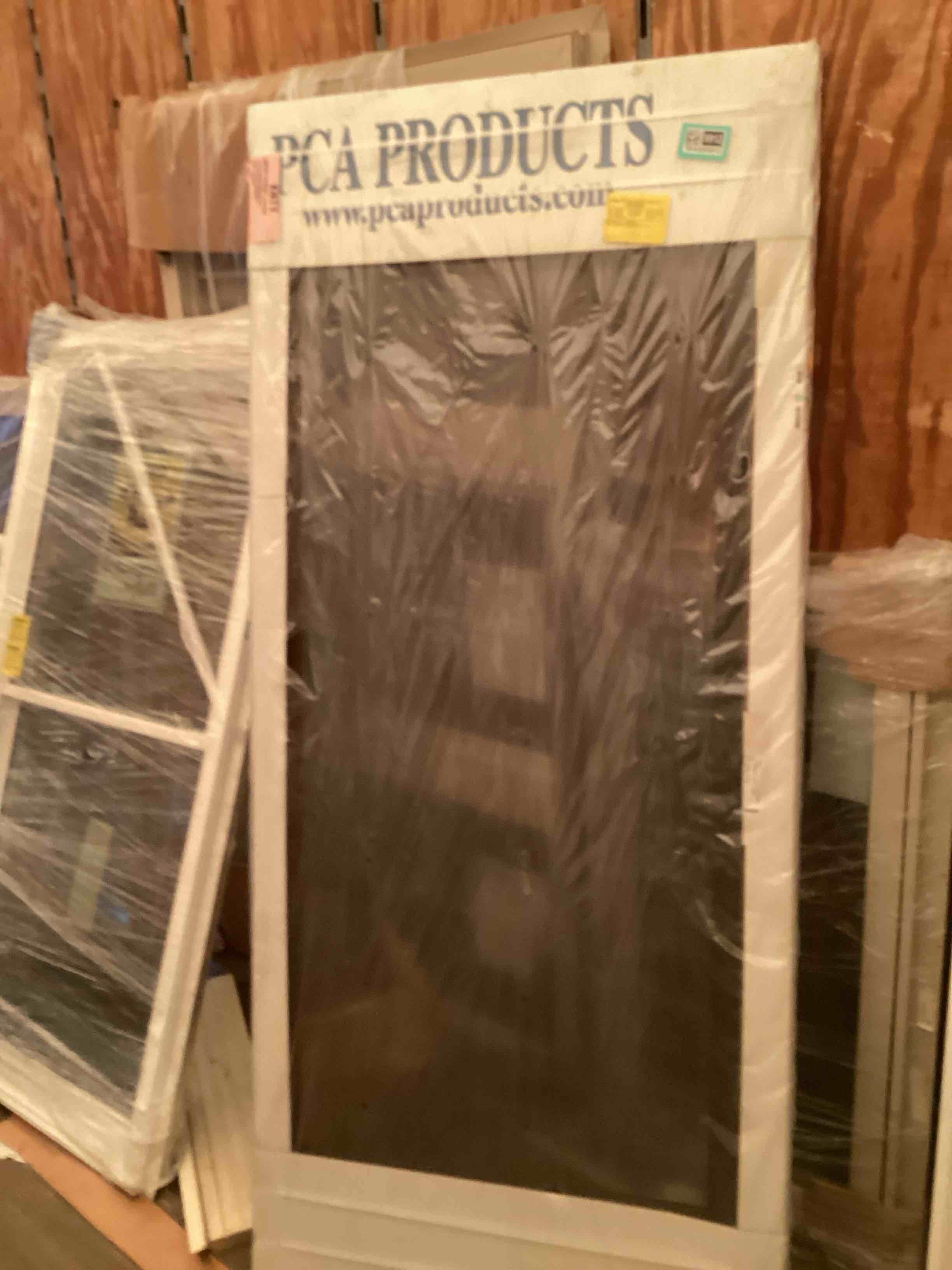 Condition photo showing New/Like New for screen door 