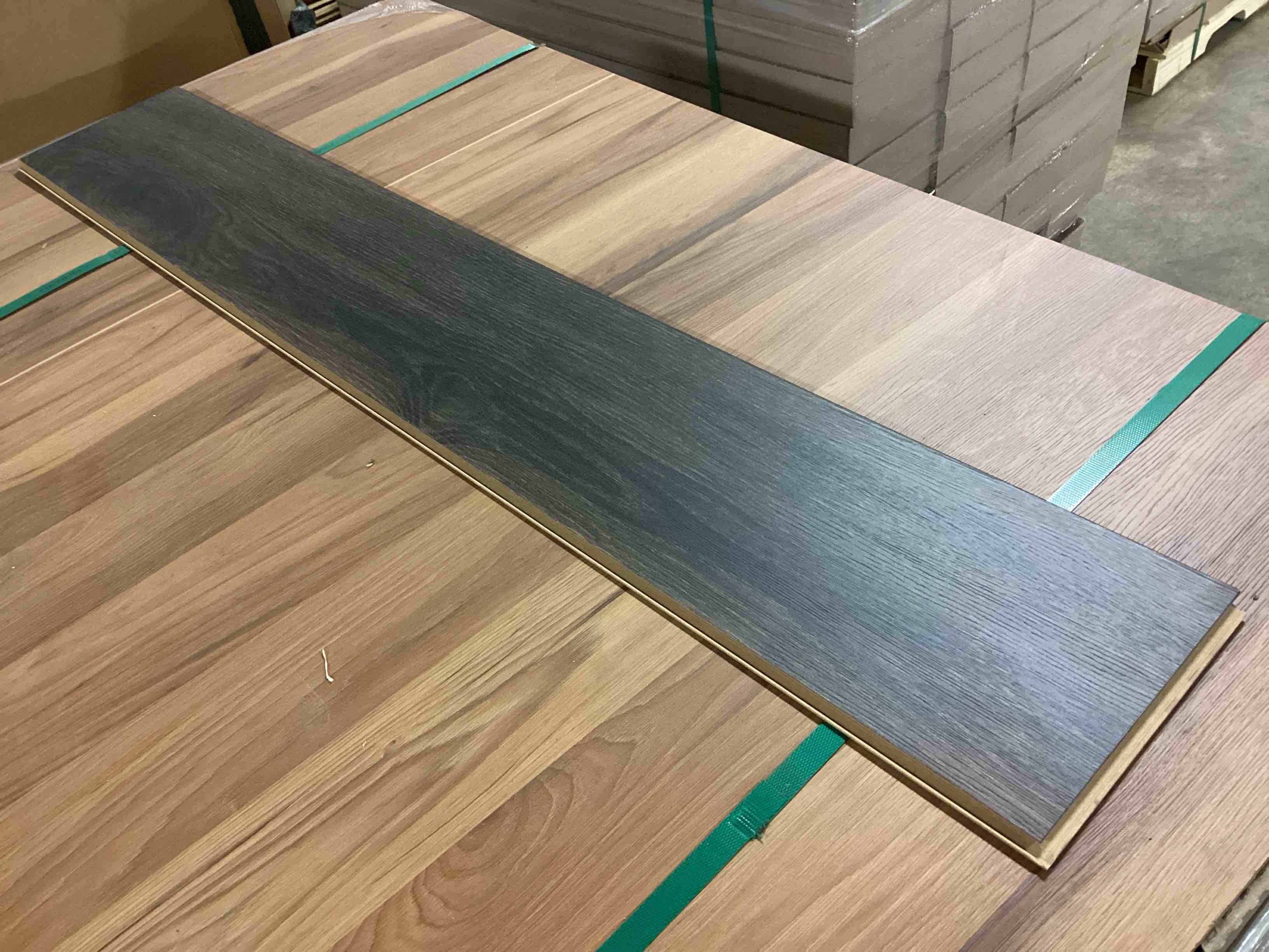 Condition photo showing As Is for 1102.26 Sq.Ft. Of 8mm Laminate Flooring, Your Bid Per Sq.Ft