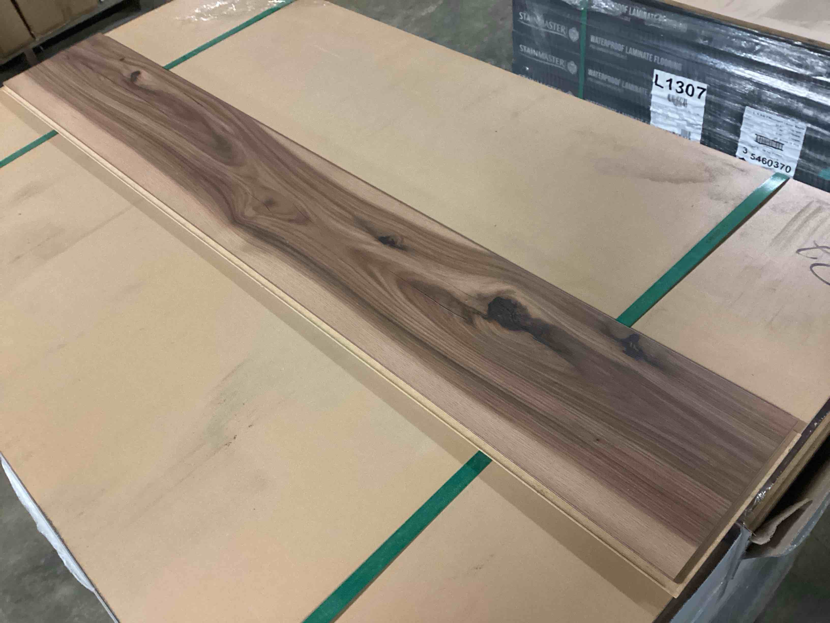 Condition photo showing New/Like New for 758.08 Sq.Ft. Of 10mm Laminate Flooring, Your Bid Per Sq.Ft