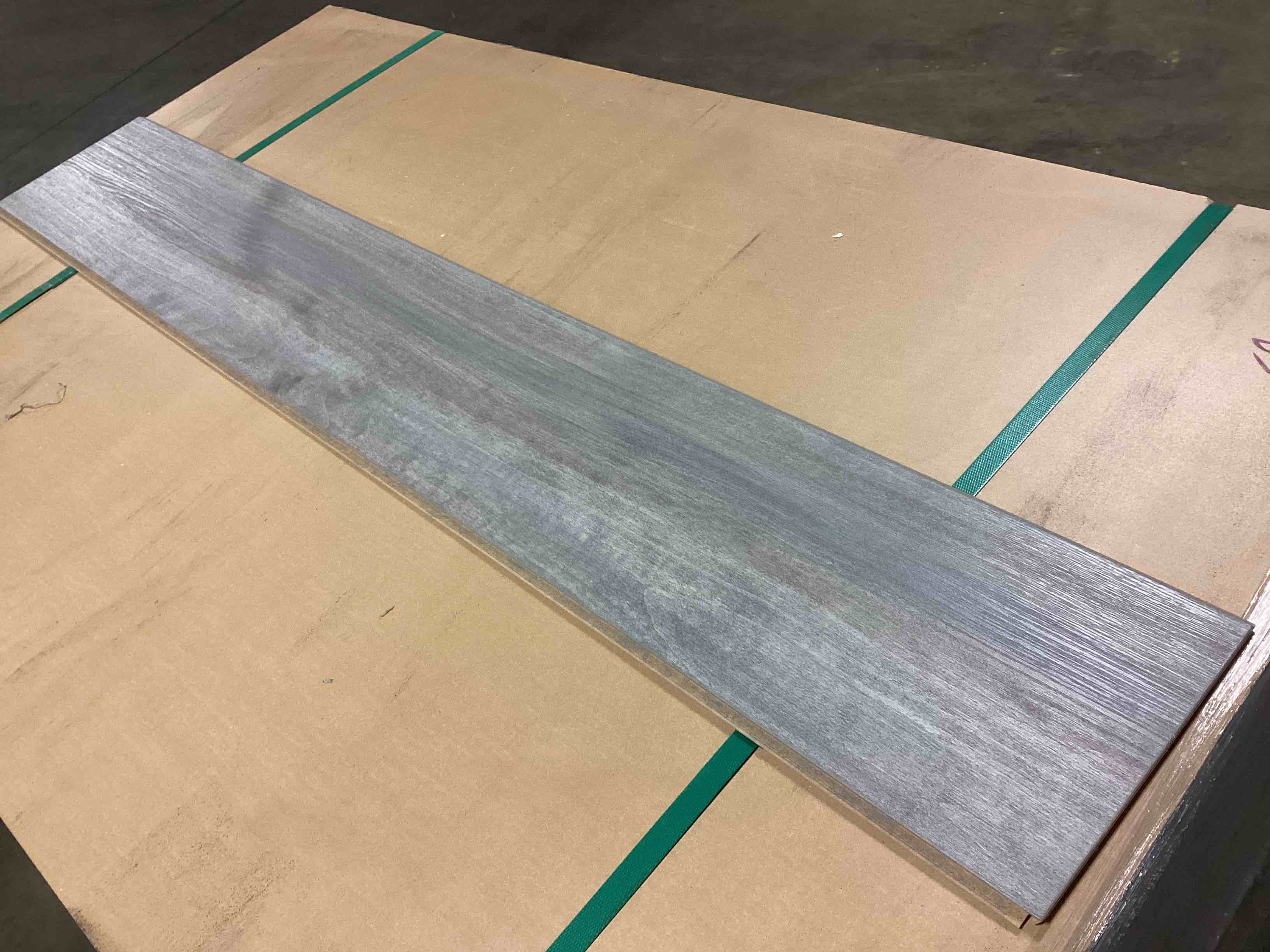 Condition photo showing New/Like New for 1473.92 Sq.Ft. Of 7mm Laminate Flooring, Your Bid Per Sq.Ft