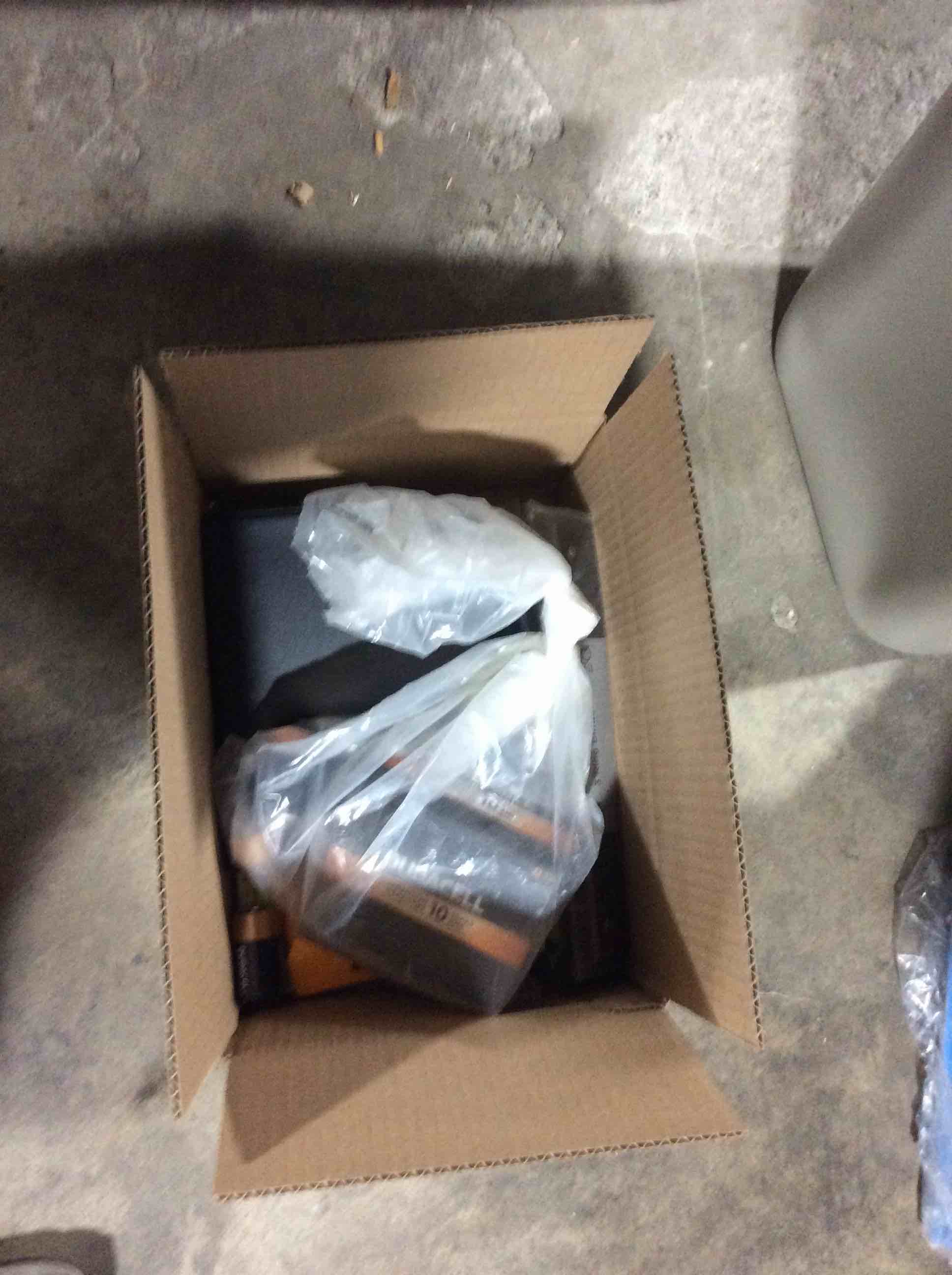 box of assorted office products 