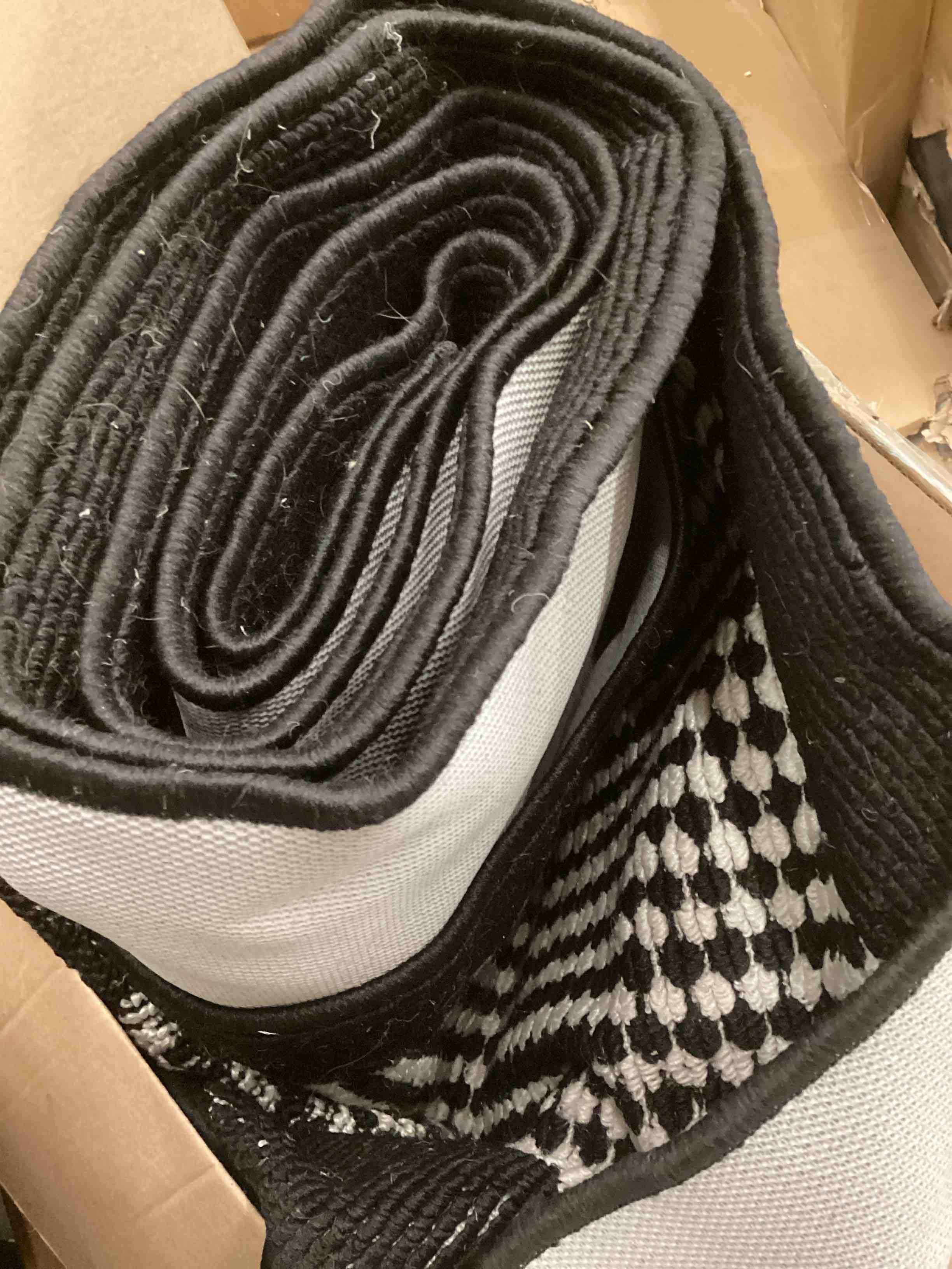 Condition photo showing As Is for Ileading Runner Rug for Hallways 2.6'x12' Heavy-Duty Durable Entryway Floor Mat with Non Slip Rubber Backing Low-Pile High Traffic Carpet Machine Washable Accent Rug for Kitchen Helloween(Black&White) 2'7" x 12' (Rectangular) Black&white