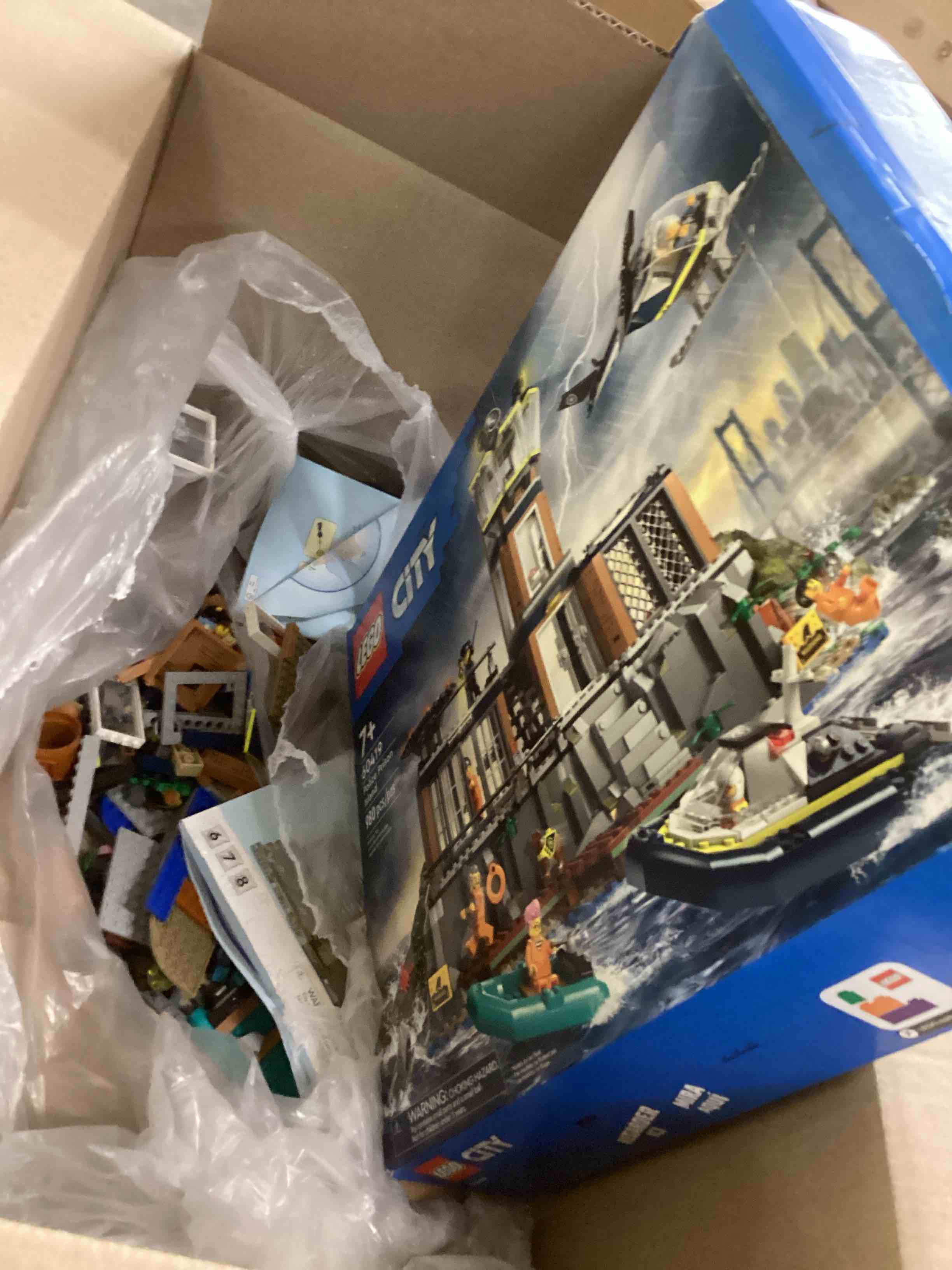 Condition photo showing As Is for LEGO City Police Prison Island Building Set, Birthday Gift for Boys and Girls Ages 7 Plus, Imaginative Play, Helicopter Toy, Boat Toy and Dinghy, 7 Minifigures with Dog and Shark, 60419