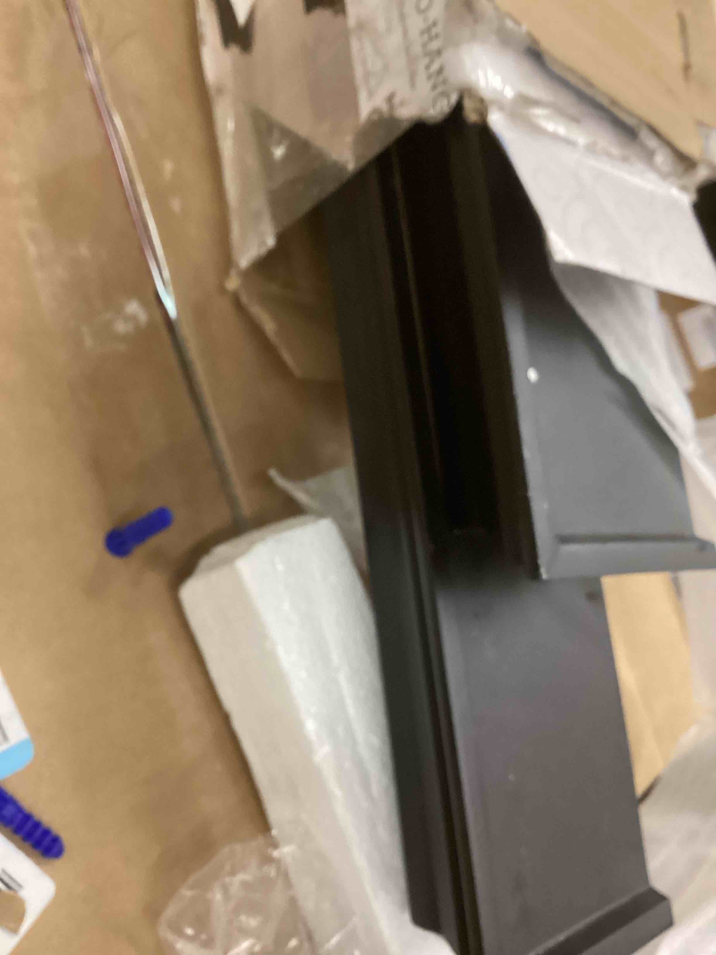 Condition photo showing As Is for Melannco Floating Wall Shelves for Bedroom, Living Room, Bathroom, Kitchen, Nursery, Set of 4, Black, 4 Count Black Set of 4 Arlington