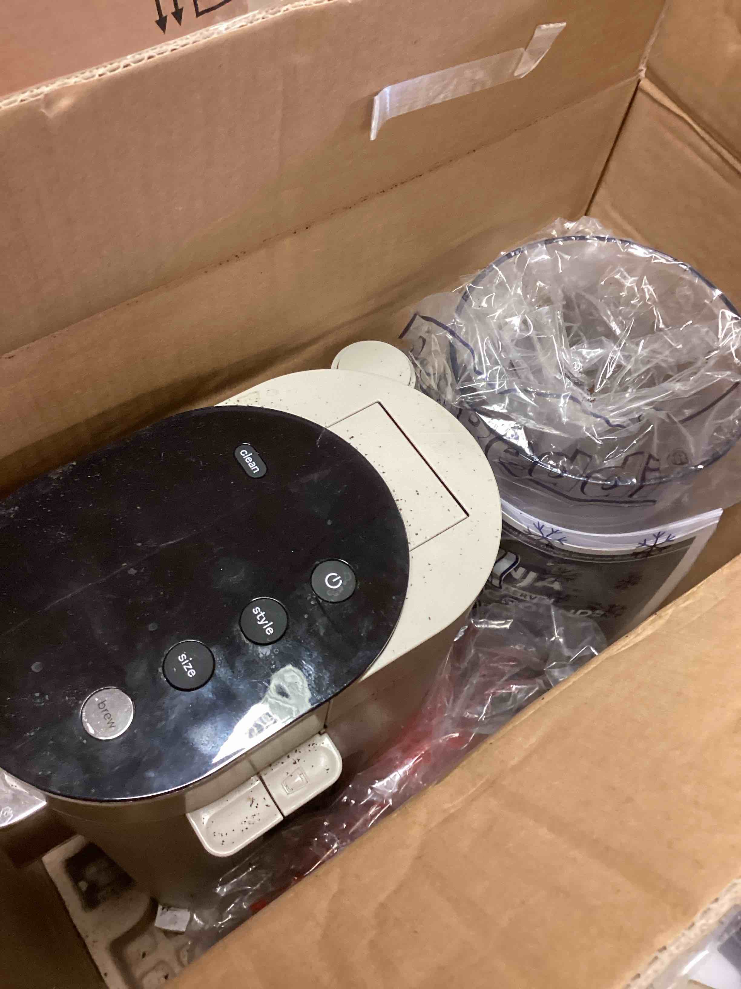 Condition photo showing As Is for Ninja Pod & Grounds Specialty Single-Serve Coffee Maker, K-Cup Pod Compatible, Brews Grounds, Compact Design, Built-In Milk Frother, 56-oz. Reservoir, 6-oz. Cup to 24-oz. Mug Sizes, Stone, PB051ST