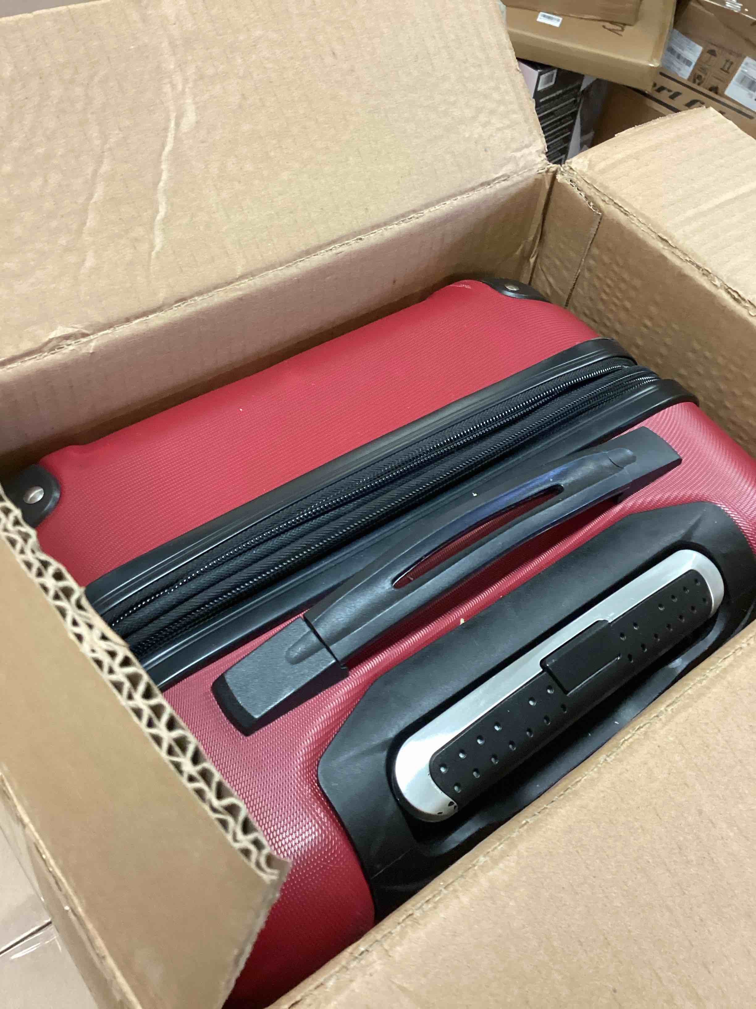 Condition photo showing Good Condition for Travelers Club Chicago Hardside Expandable Spinner Luggage, Rhubarb, 22" Carry-On 22" Carry-On Rhubarb