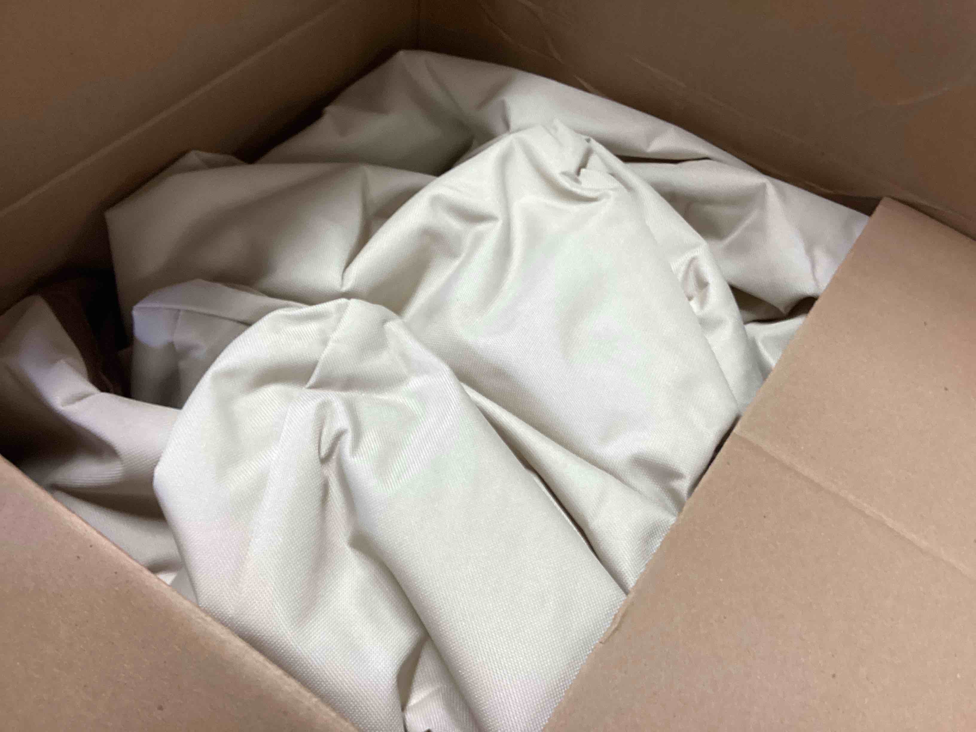 Condition photo showing Good Condition for Amazon Basics Patio Furniture Cover, Waterproof, Anti-UV, Wind Resistant, X-Large, Durable, Beige/Tan, 130" x 84" 130"x84"