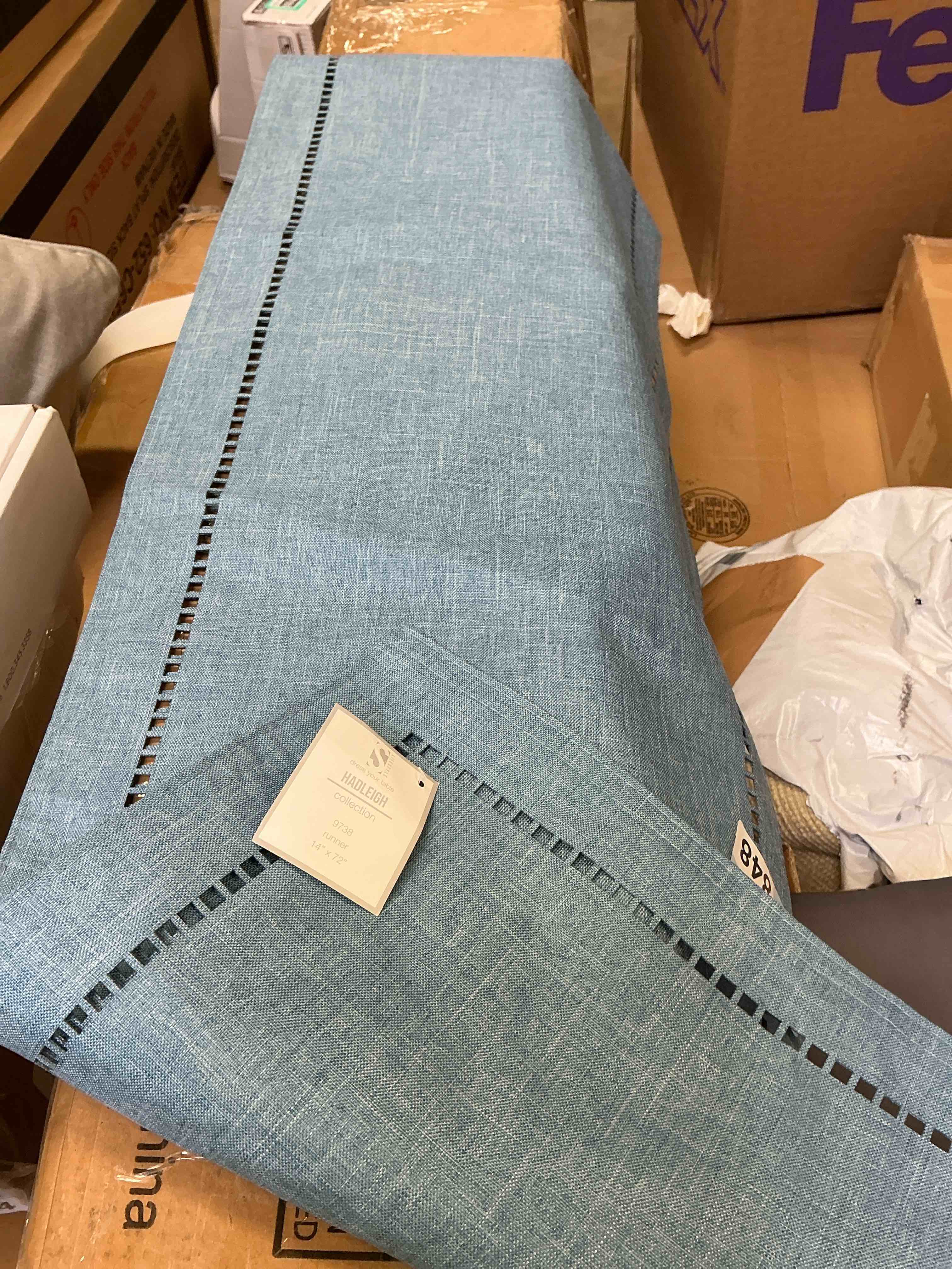 Condition photo showing New/Like New for neith polyester rectangle table runner 72” x 14” 