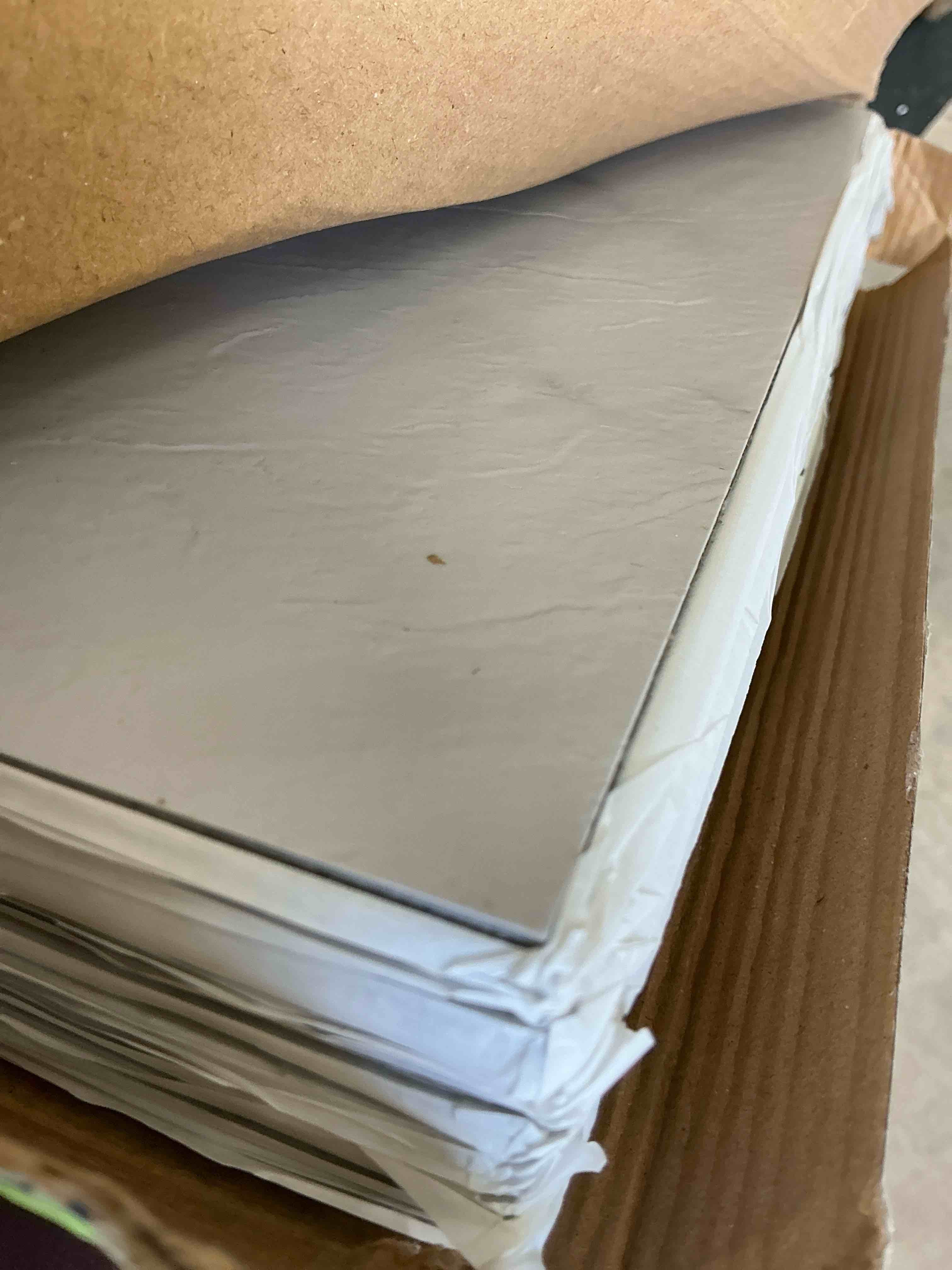 Condition photo showing New/Like New for palazzo self adhesive 12-inch vinyl floor tiles, 20 rectangular tiles - 12" x 24", luxe white pattern - peel & stick, diy flooring for kitchen, dining room, & bedrooms by achim home décor marble-look