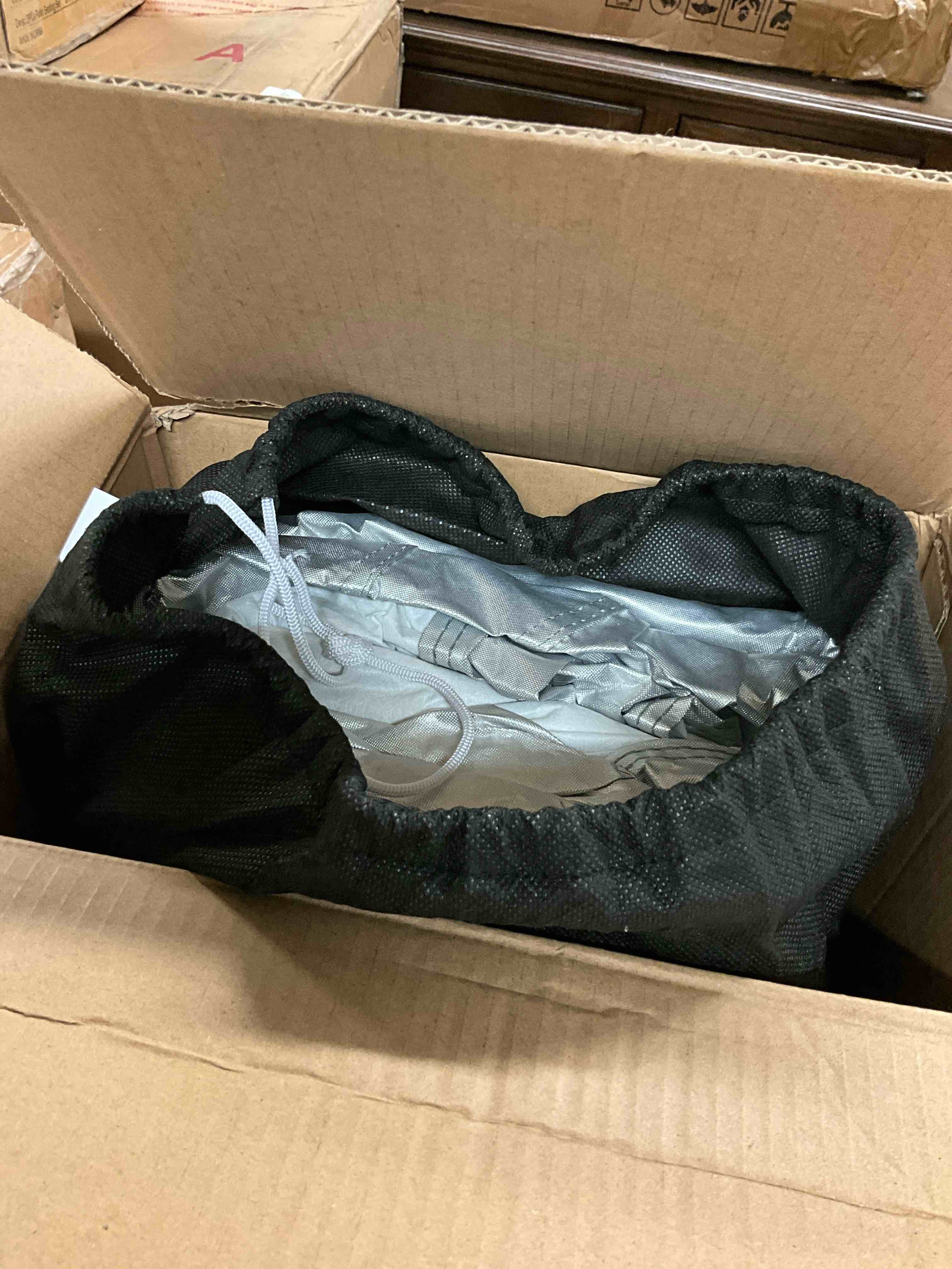 Condition photo showing New/Like New for basics silver weatherproof car cover - peva with cotton, sedans up to 180"
