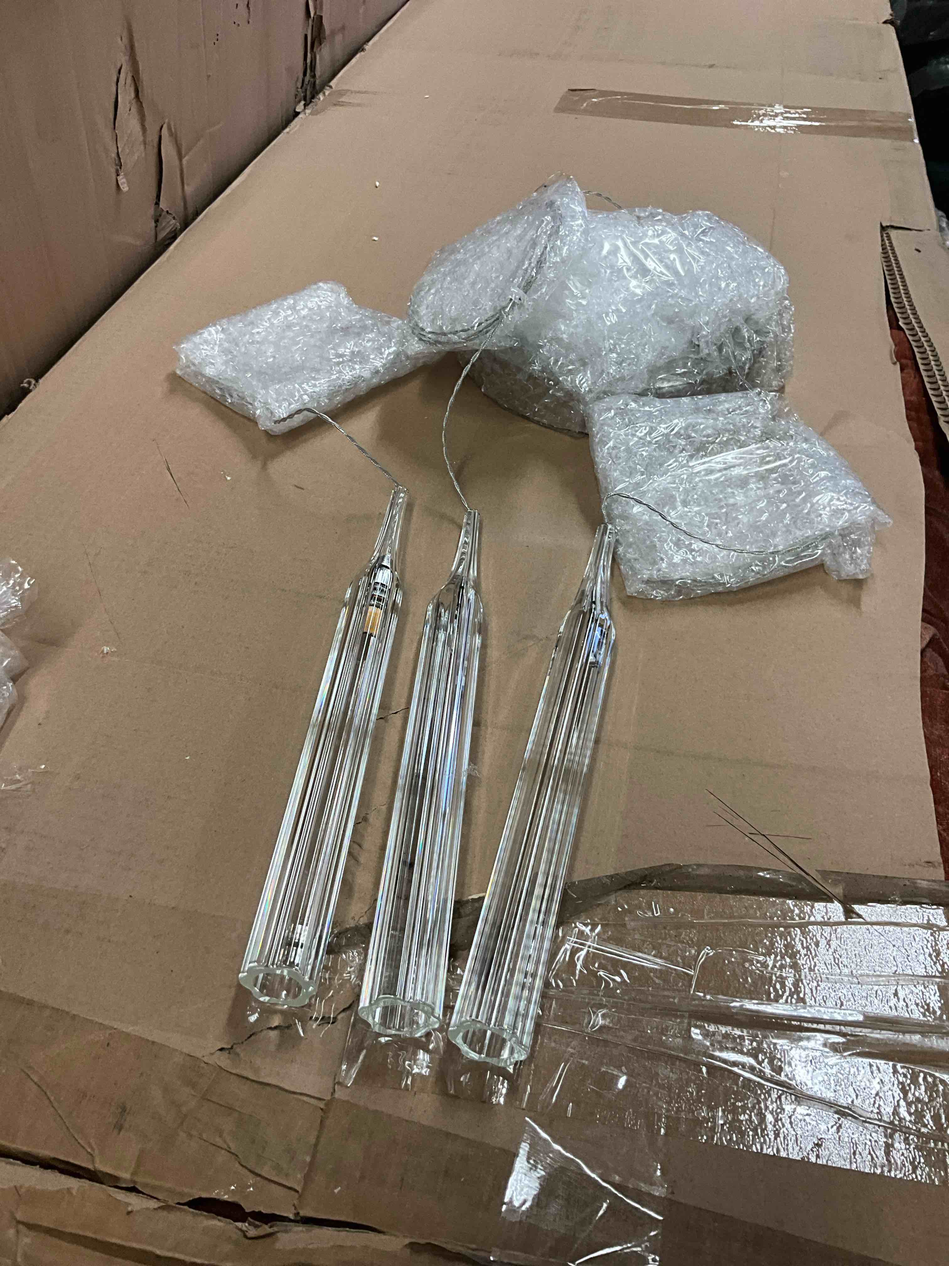 Condition photo showing New/Like New for hand-blown elongated prism pendant light - 3 light modern chandelier