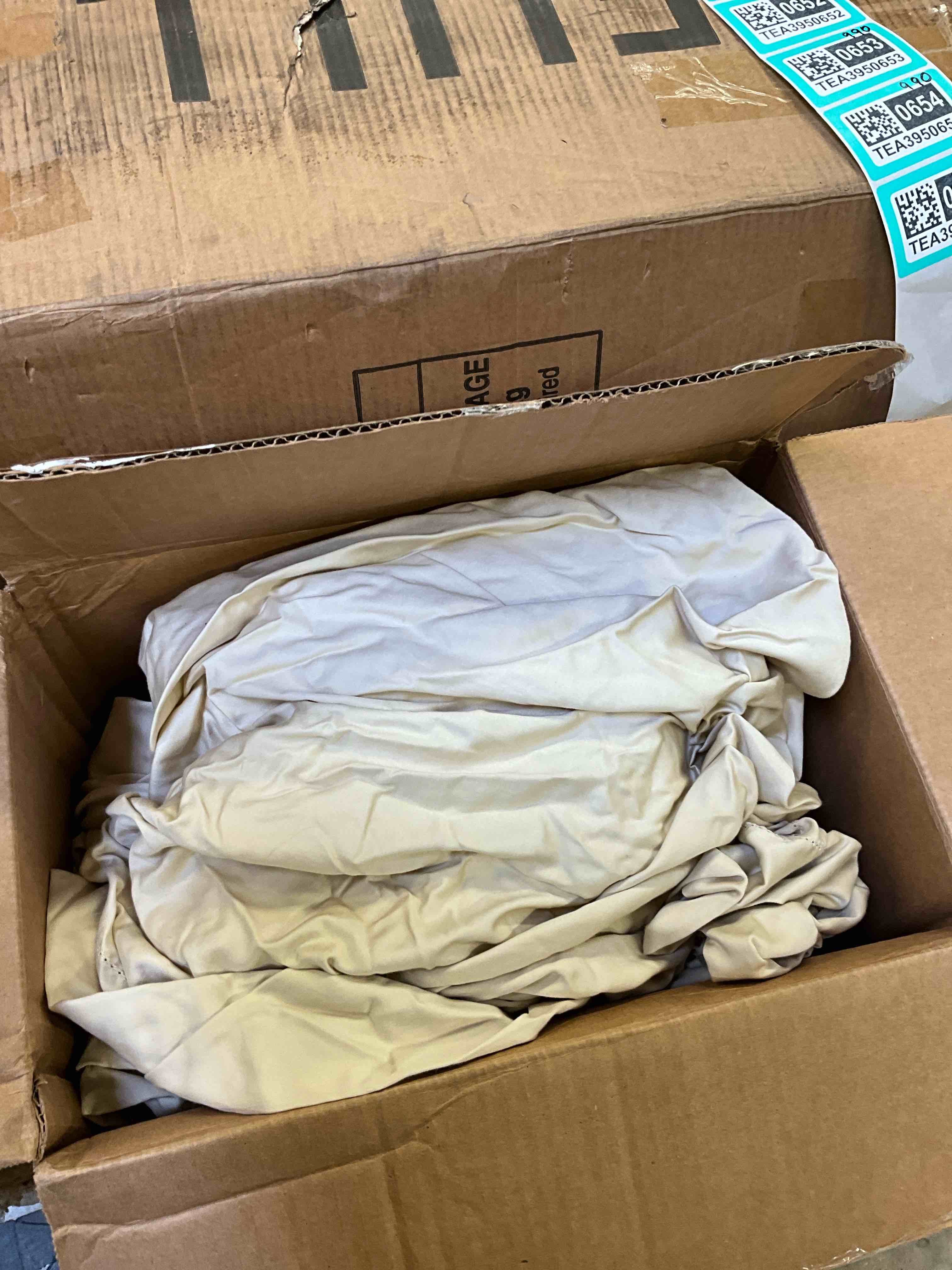Condition photo showing As Is for bed sheets,beige
