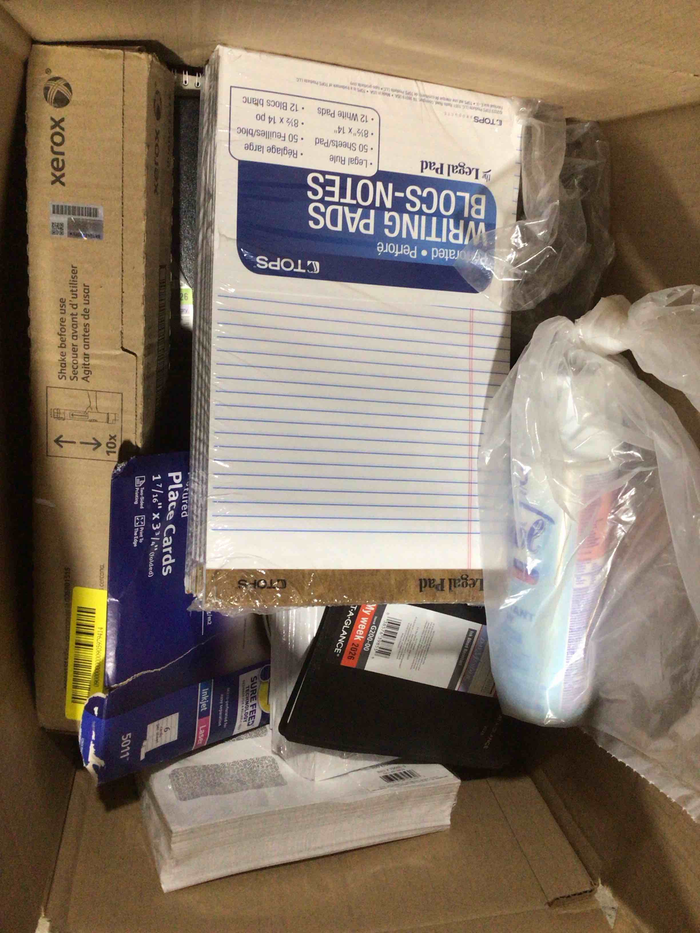 utilities supplies, lysol, copy paper., drawer organizer, writing pad and more 